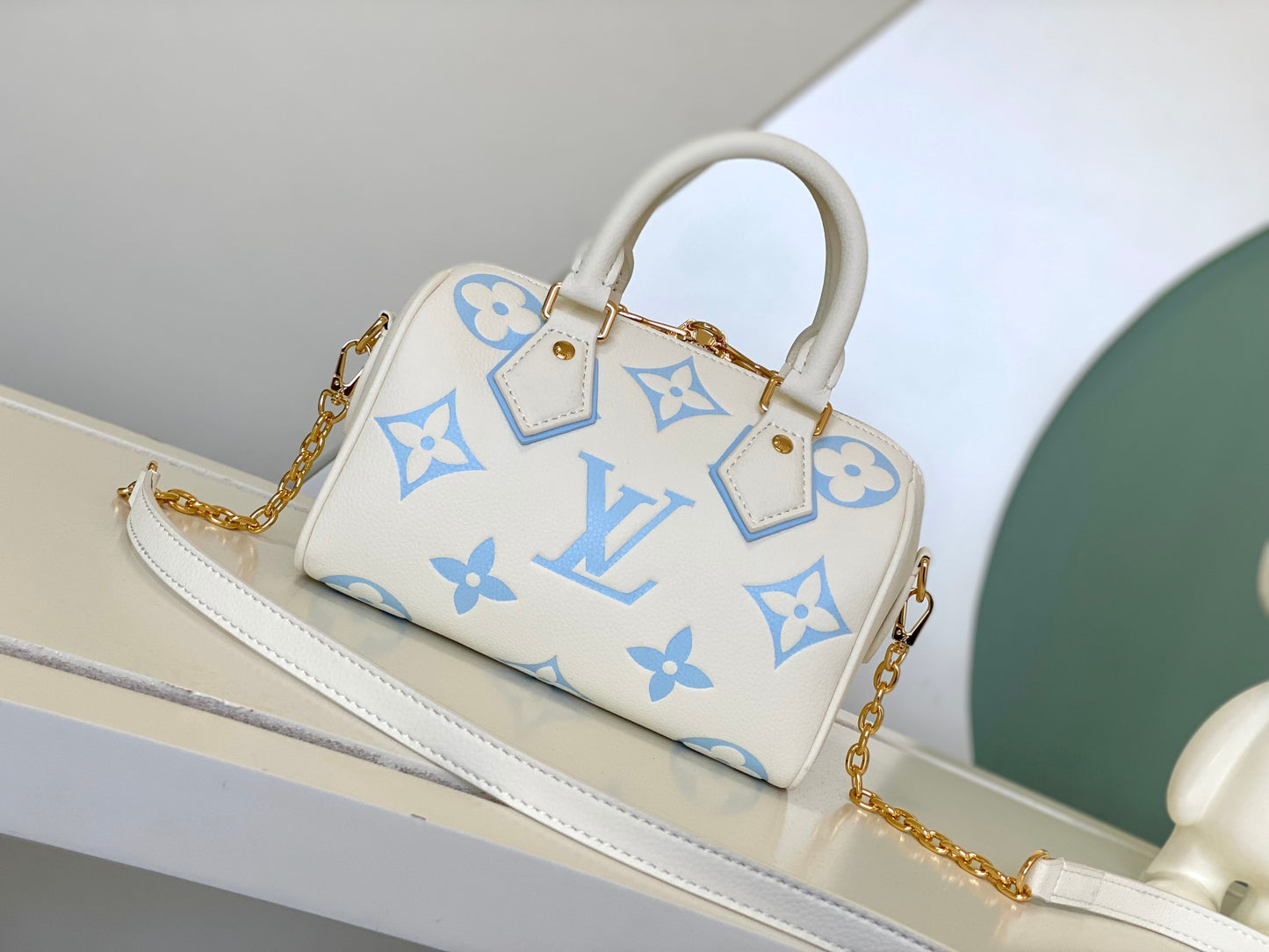 Louis Vuitton Cream and Pastel Blue Embossed Leather Mini Duffle Handbag
