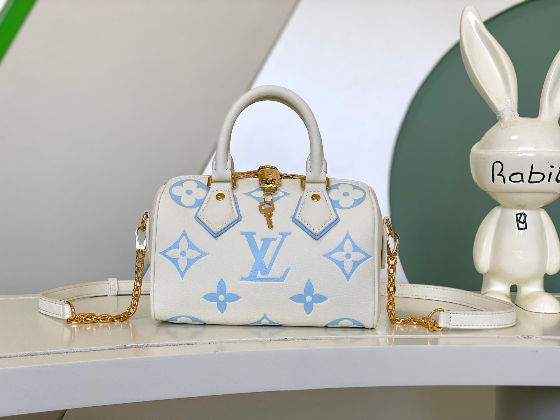 Louis Vuitton Cream and Pastel Blue Embossed Leather Mini Duffle Handbag