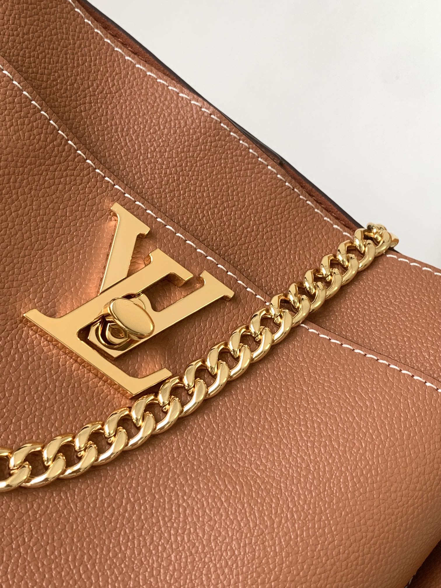 Louis Vuitton Classic Brown Leather Bucket Bag with Gold Chain Shoulder Strap