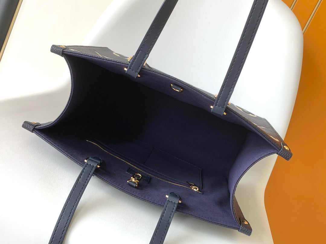 Louis Vuitton Elegant Navy Blue Leather Tote Bag with Floral Monogram Pattern