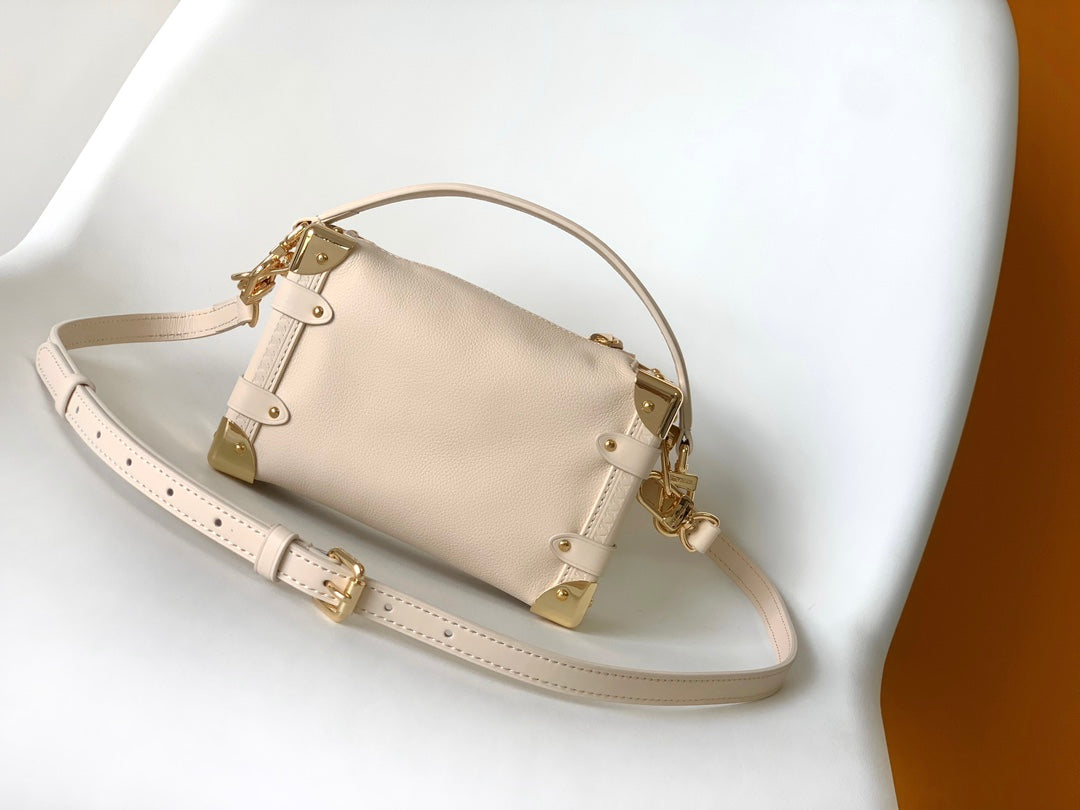 Louis Vuitton Elegant Cream Leather Trunk Shoulder Bag with Gold Hardware