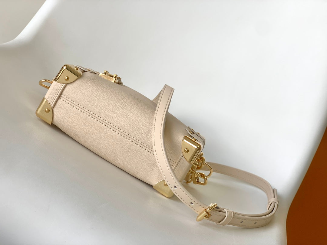 Louis Vuitton Elegant Cream Leather Trunk Shoulder Bag with Gold Hardware