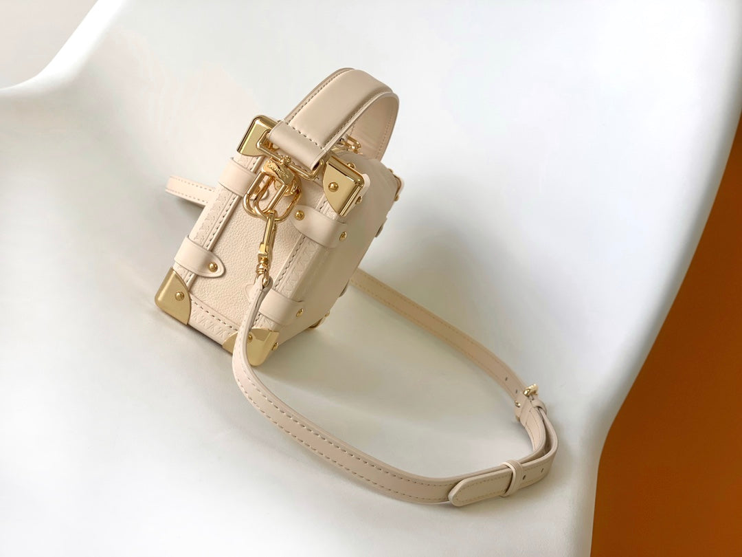 Louis Vuitton Elegant Cream Leather Trunk Shoulder Bag with Gold Hardware