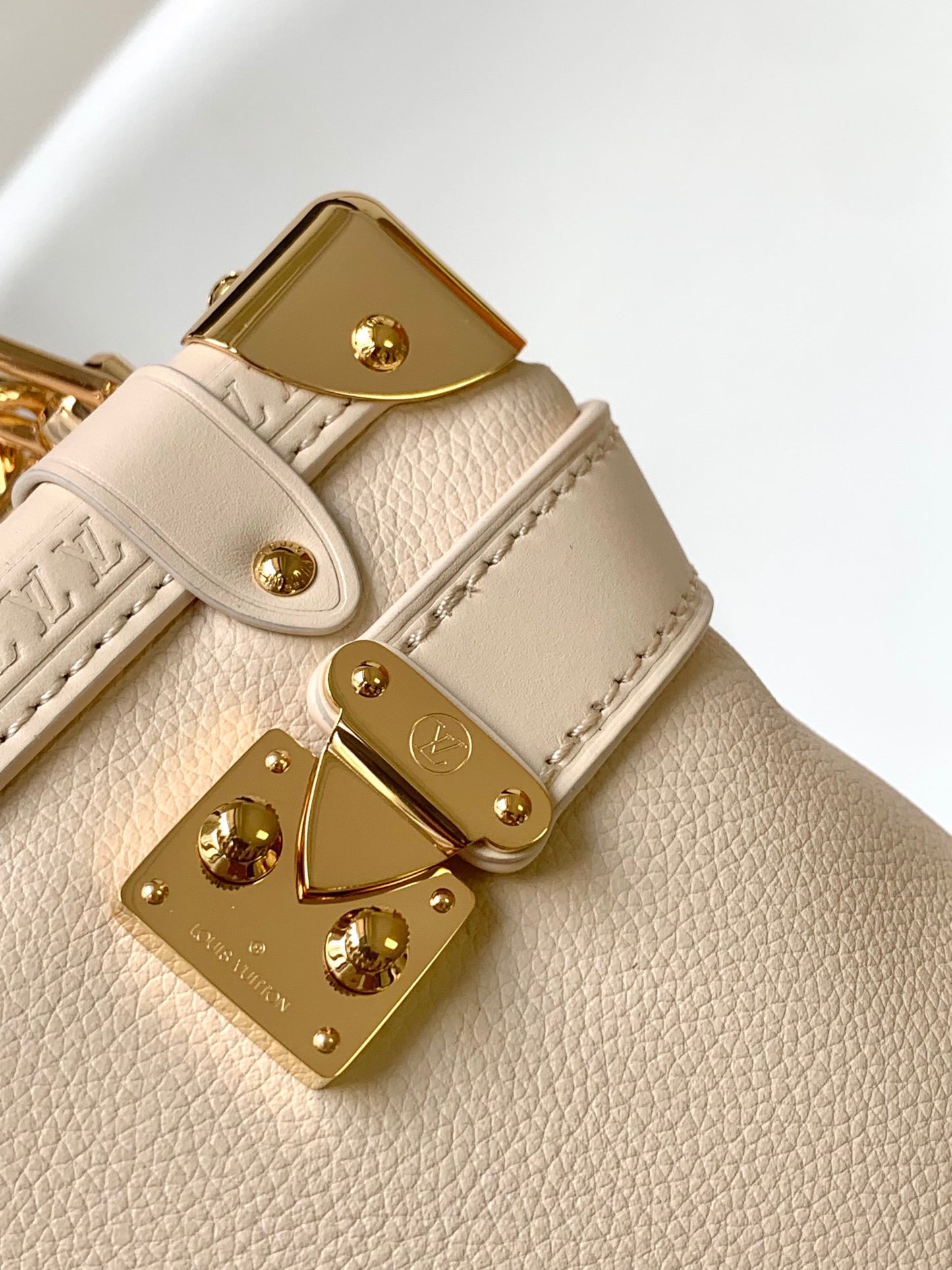 Louis Vuitton Elegant Cream Leather Trunk Shoulder Bag with Gold Hardware