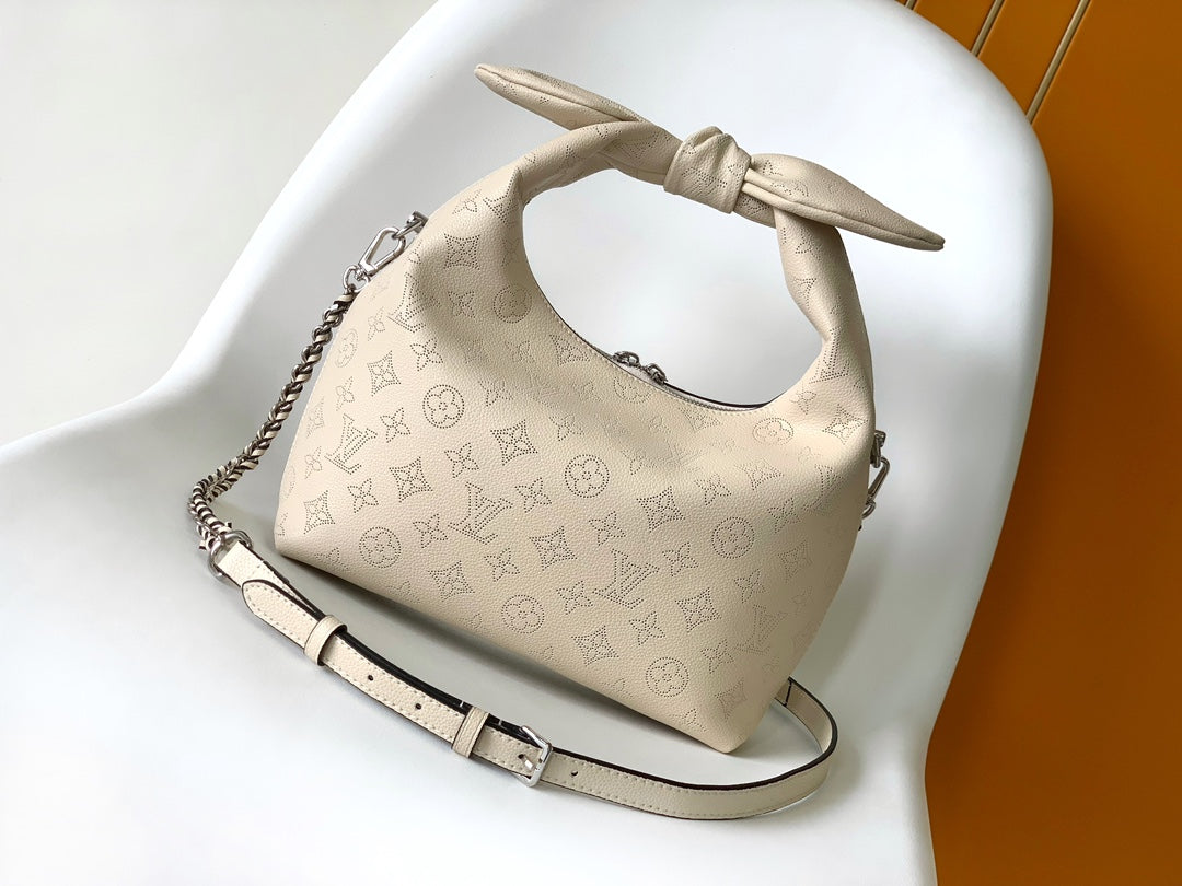 Louis Vuitton Pink Perforated Leather Hobo Bag with Bow Handle and Chain Strap