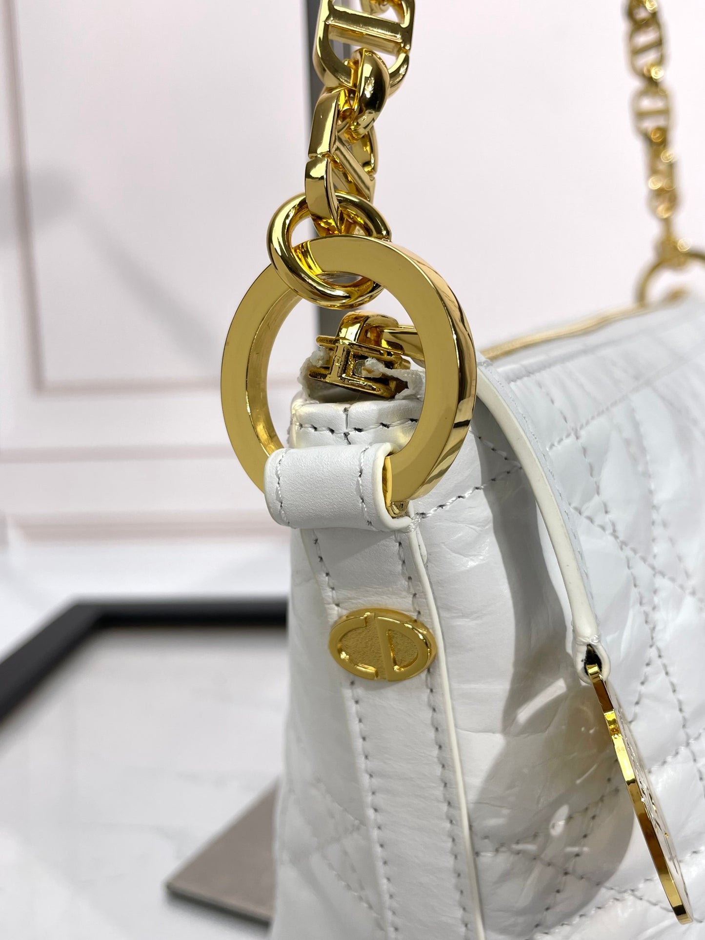 Dior Elegant White Quilted Hobo Handbag with Gold Chain Strap