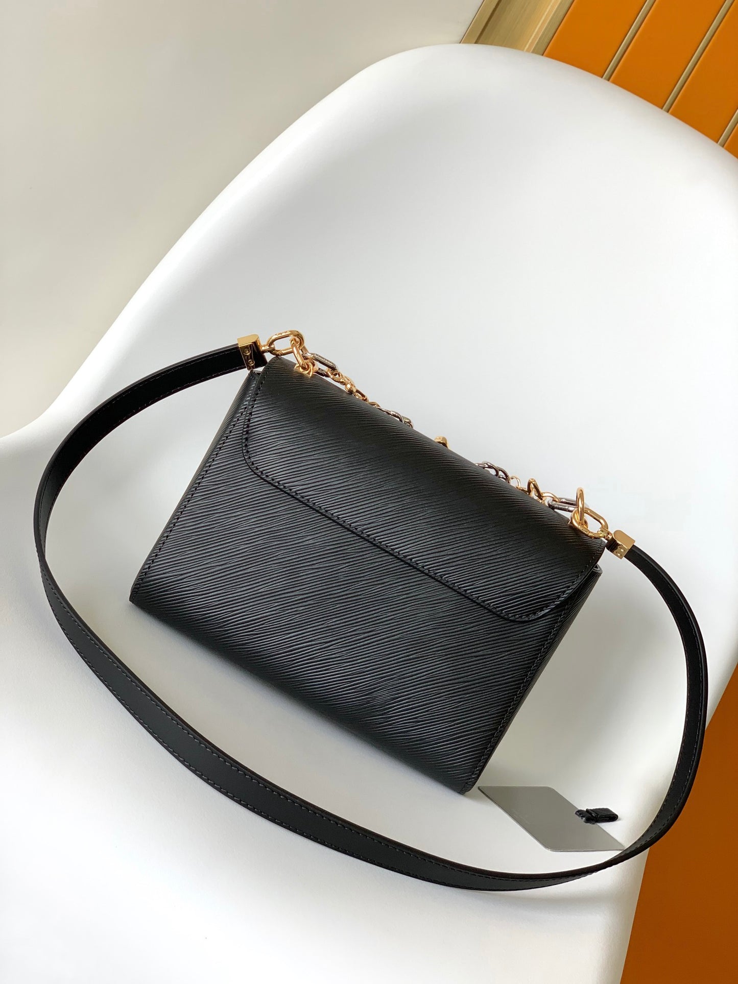 Louis Vuitton Luxury Black Leather Shoulder Bag with Two-Tone Metallic Clasp