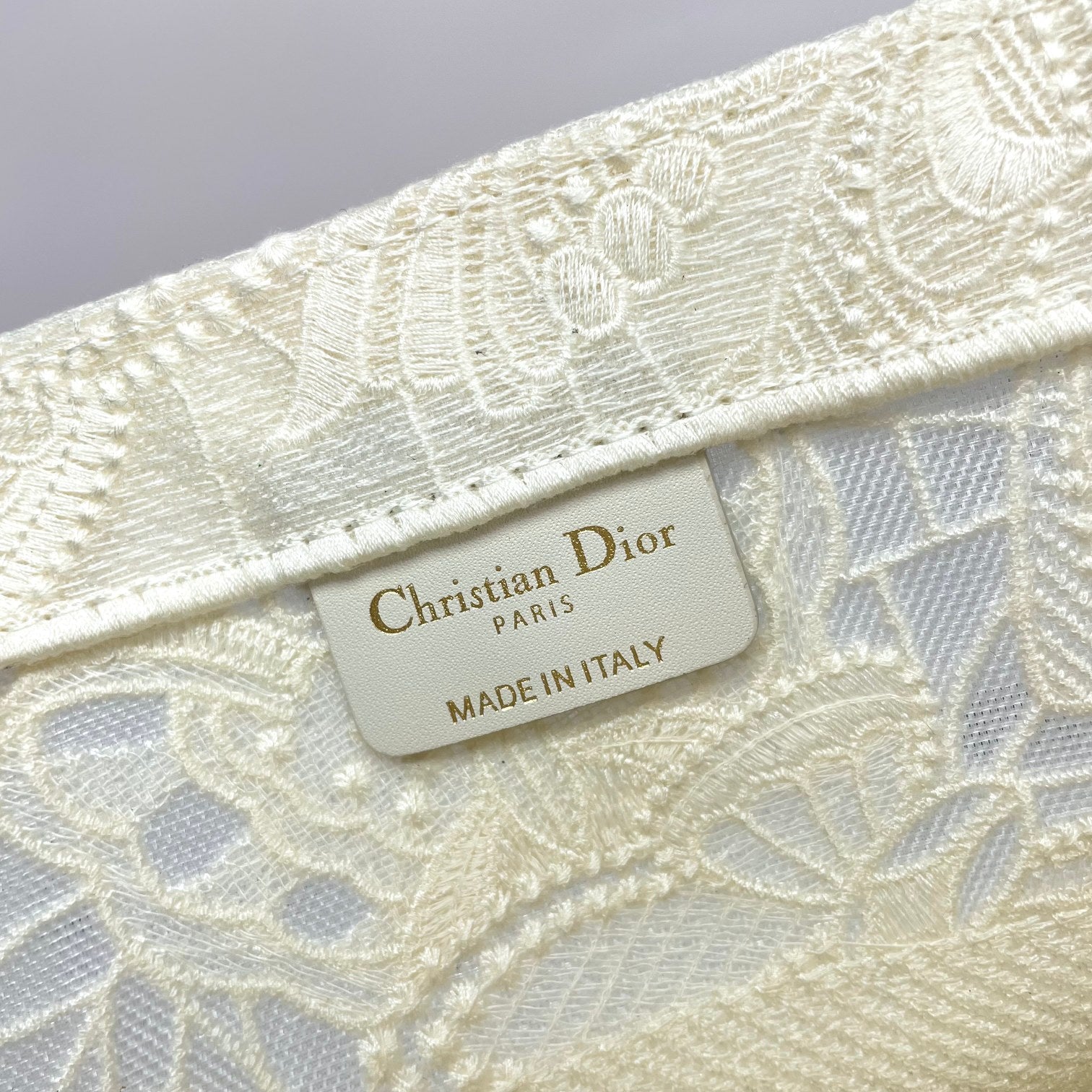 Dior Elegant Cream Canvas Tote Bag with Embroidered Lace Pattern