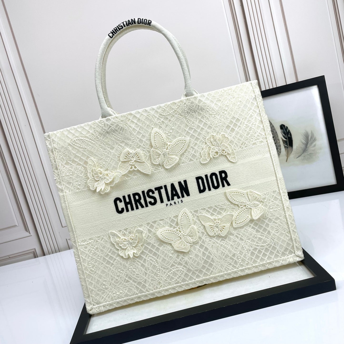 Dior Elegant Cream Canvas Handbag with 3D Textured Butterfly Appliqué