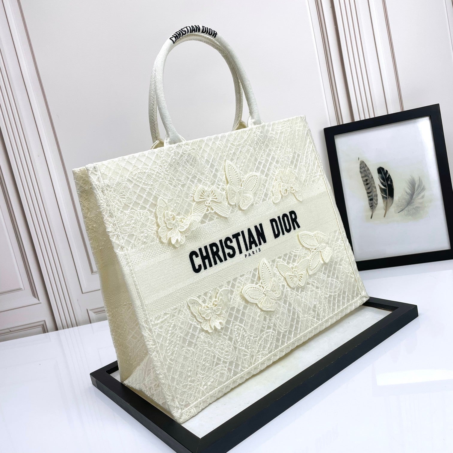Dior Elegant Cream Canvas Handbag with 3D Textured Butterfly Appliqué