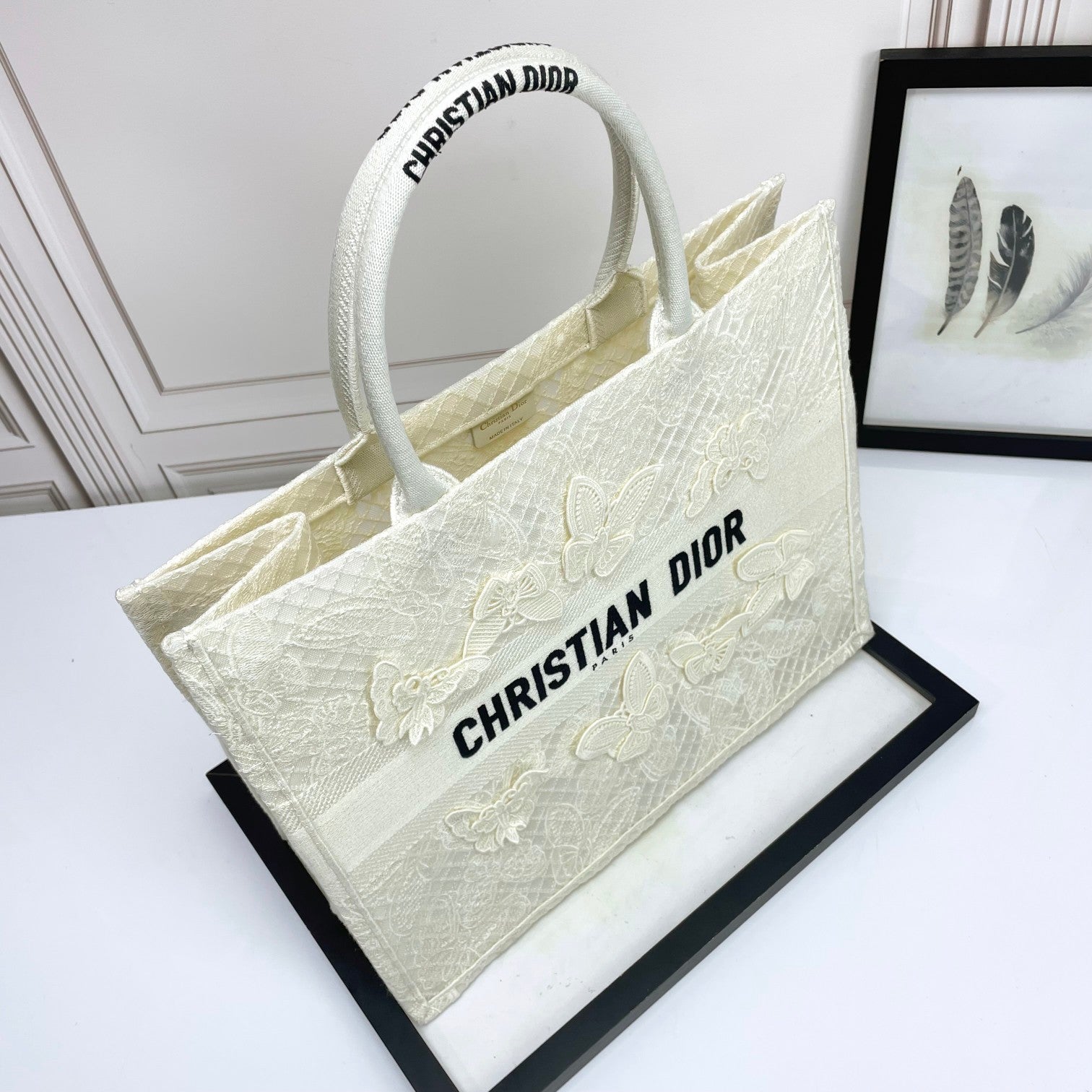 Dior Elegant Cream Canvas Handbag with 3D Textured Butterfly Appliqué