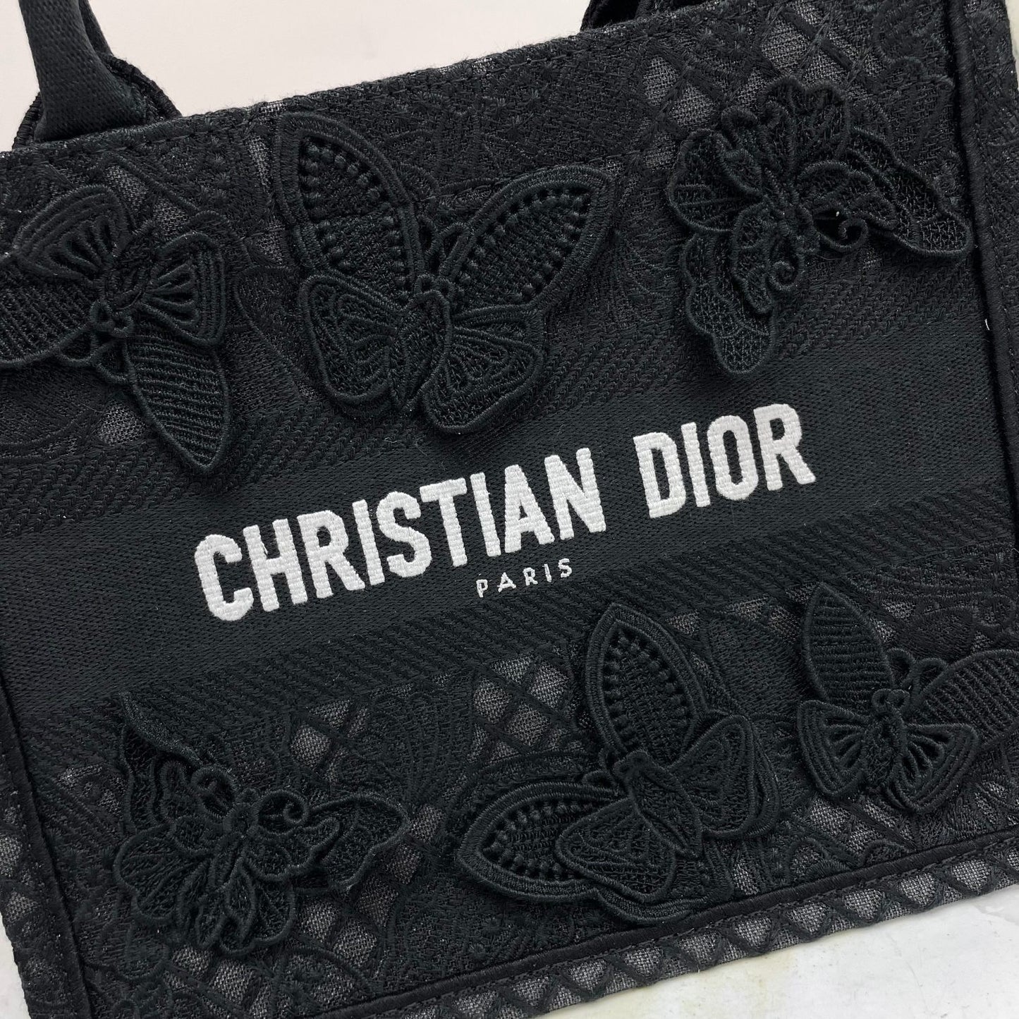 Dior Elegant Black Canvas Tote Bag with Embroidered Butterfly Detail