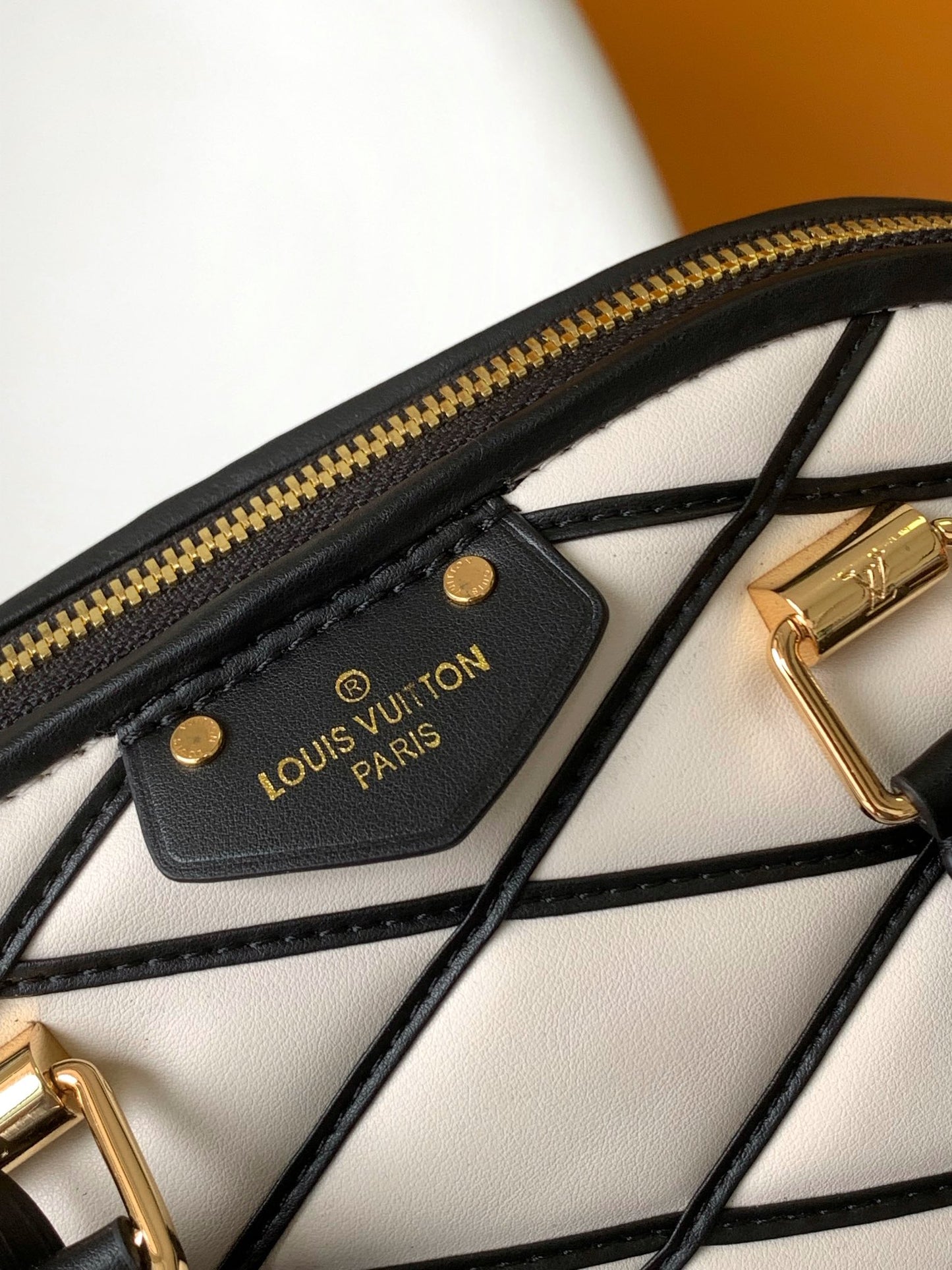 Louis Vuitton Elegant Black and White Diamond Lattice Dome Satchel Bag
