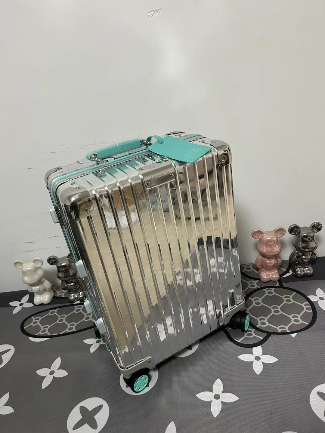 Metallic Silver Ribbed Hard Shell Carry-On Suitcase with Teal Accents