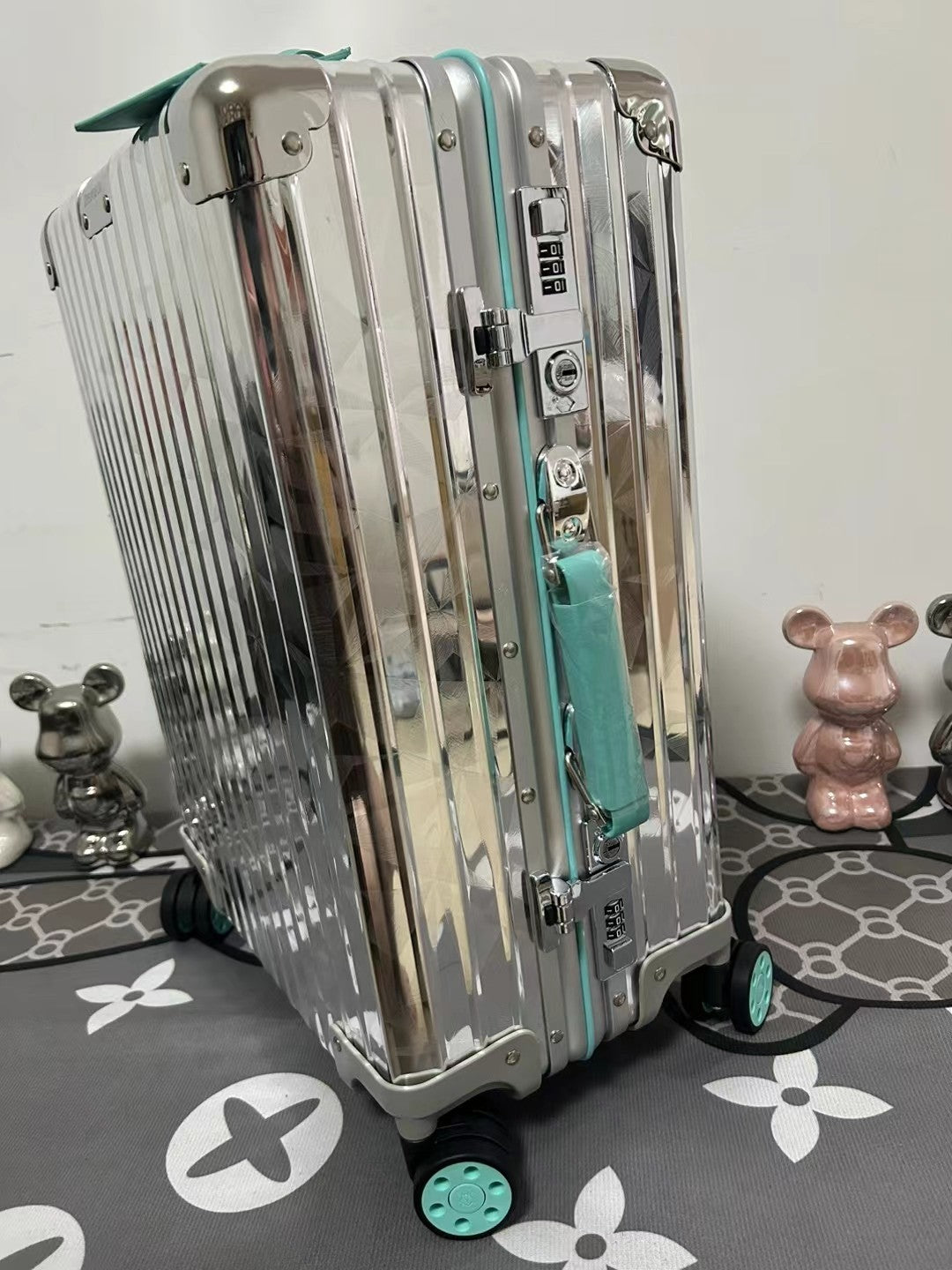 Metallic Silver Ribbed Hard Shell Carry-On Suitcase with Teal Accents
