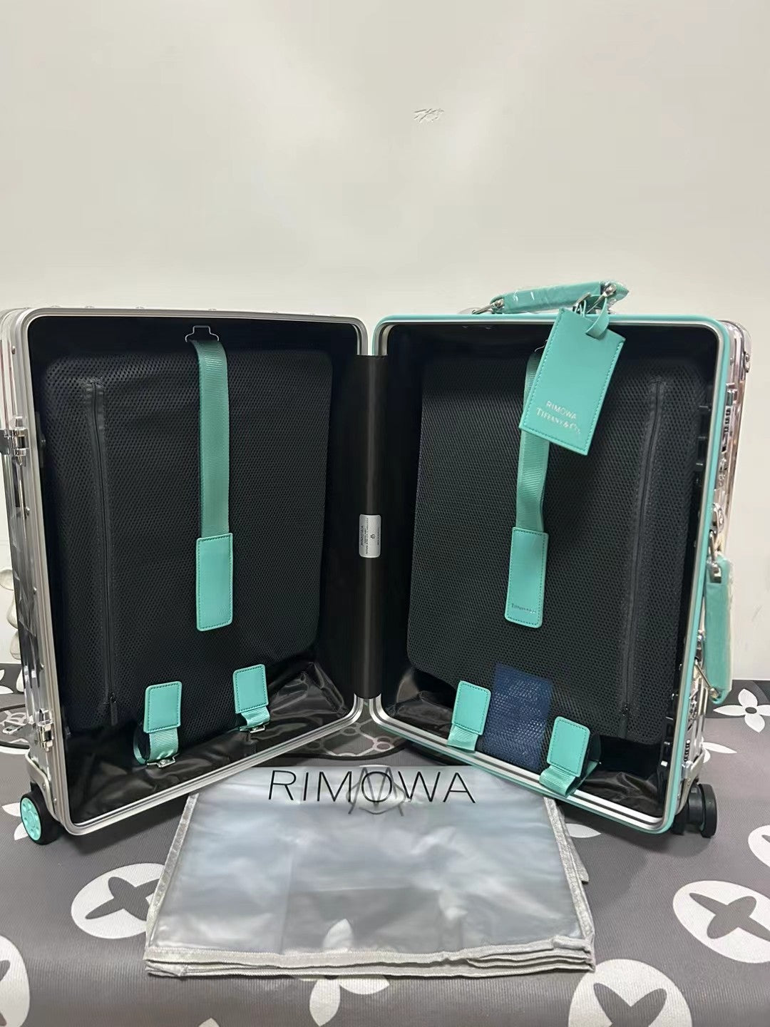 Metallic Silver Ribbed Hard Shell Carry-On Suitcase with Teal Accents