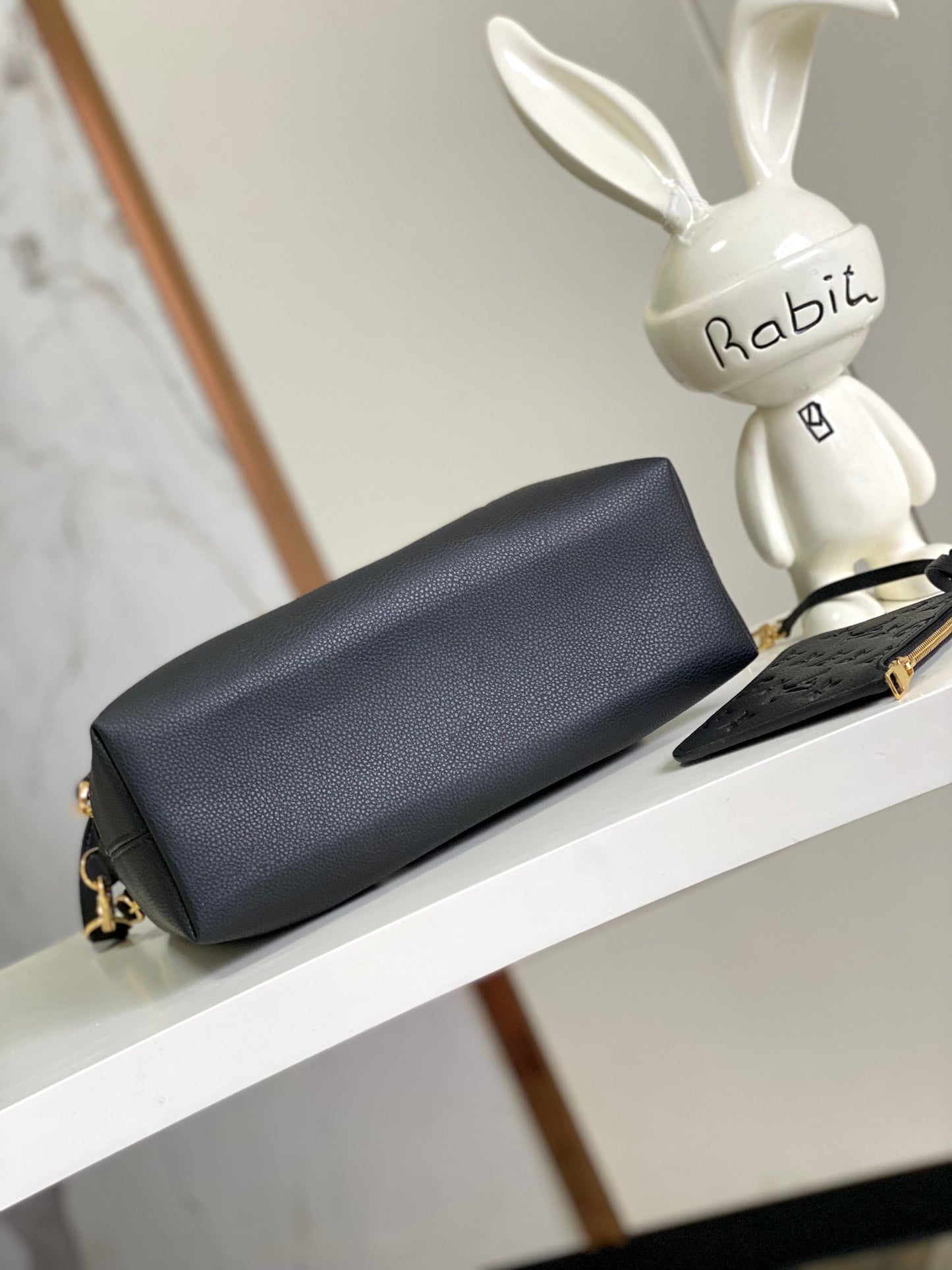 Louis Vuitton Elegant Black Embossed Leather Drawstring Shoulder Bag