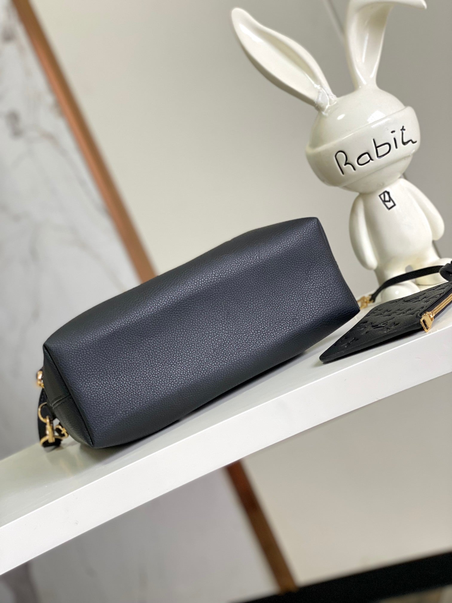 Louis Vuitton Elegant Black Embossed Leather Drawstring Shoulder Bag
