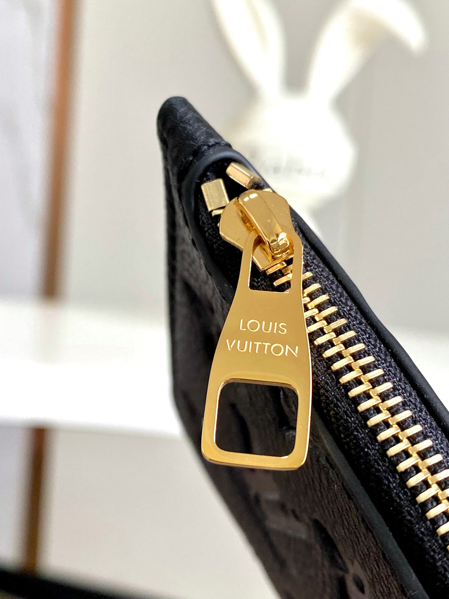 Louis Vuitton Elegant Black Embossed Leather Drawstring Shoulder Bag