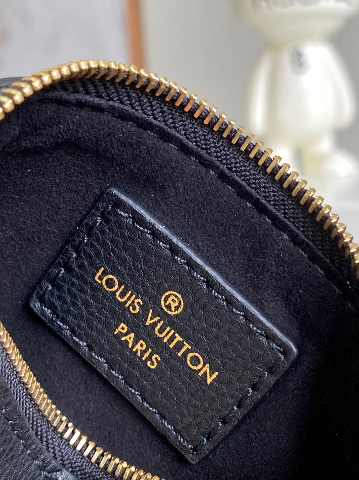 Louis Vuitton Elegant Black Embossed Leather Drawstring Shoulder Bag