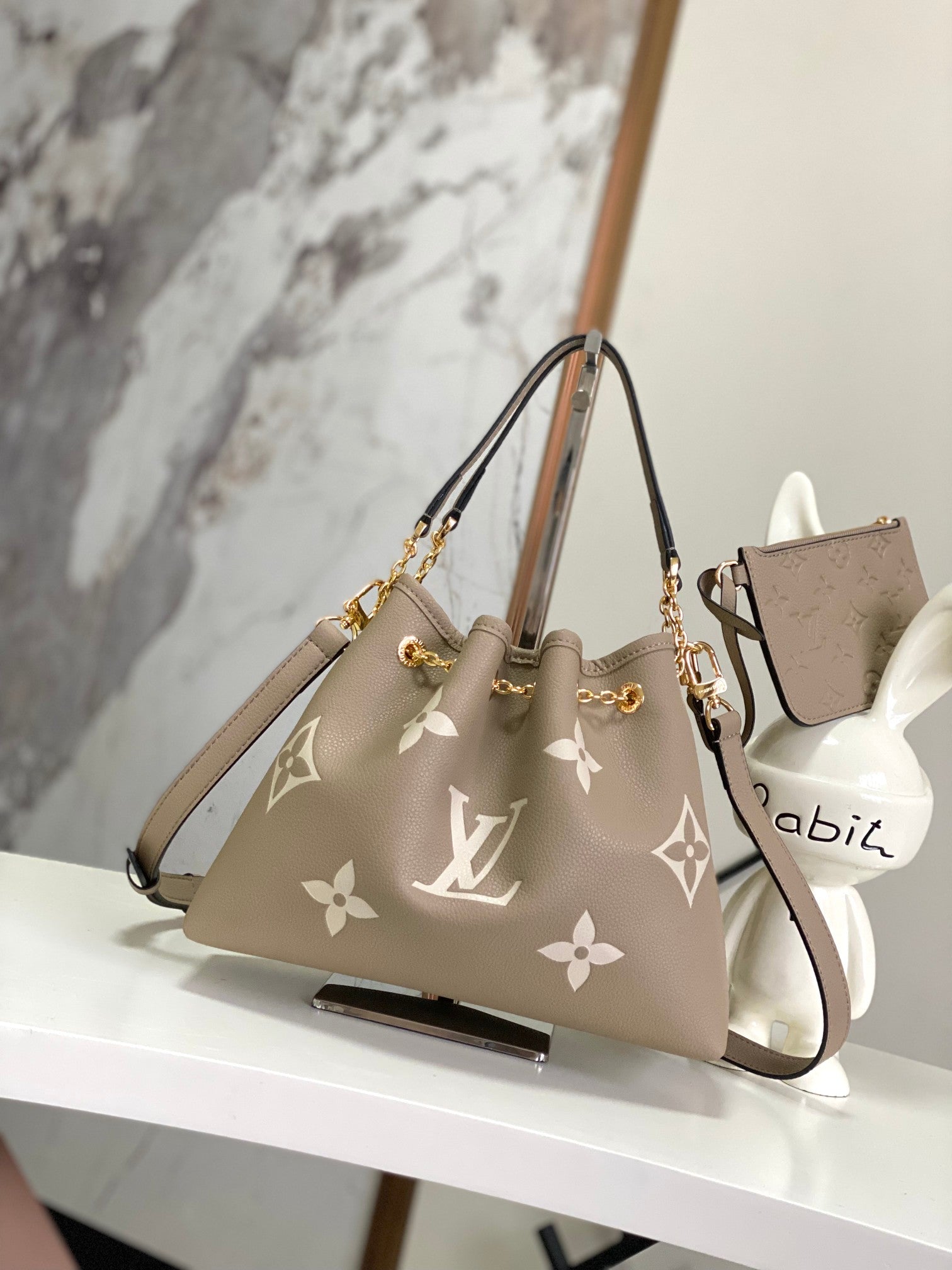 Louis Vuitton Elegant Monogram Leather Bucket Shoulder Bag in Taupe and Cream