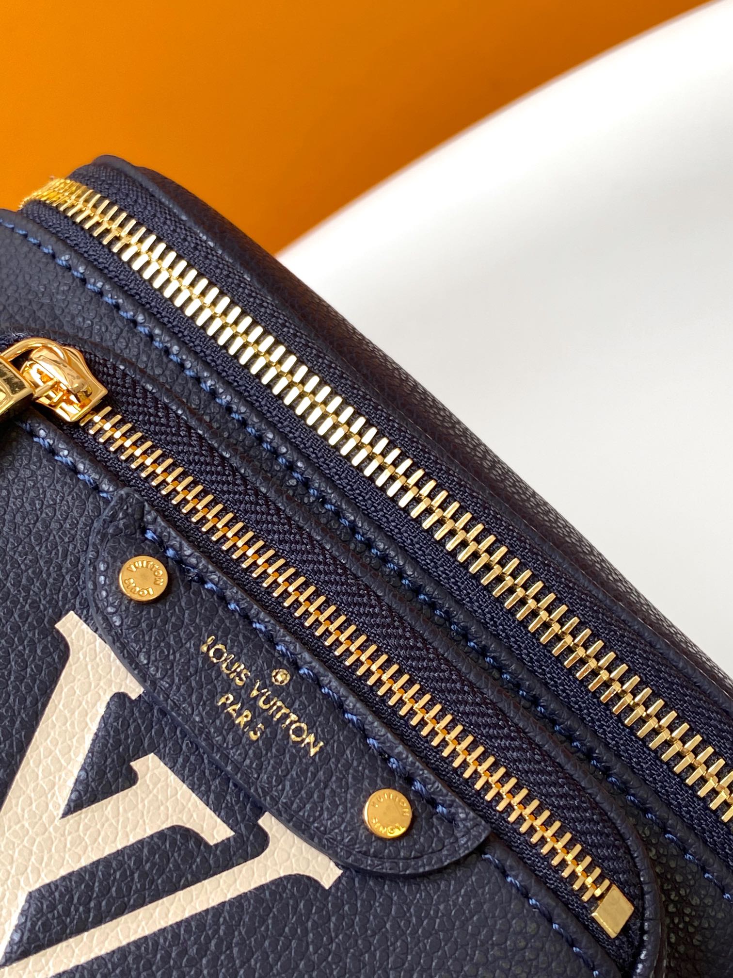 Louis Vuitton Navy Blue Leather Belt Bag with Gold Chain Strap and Floral Design
