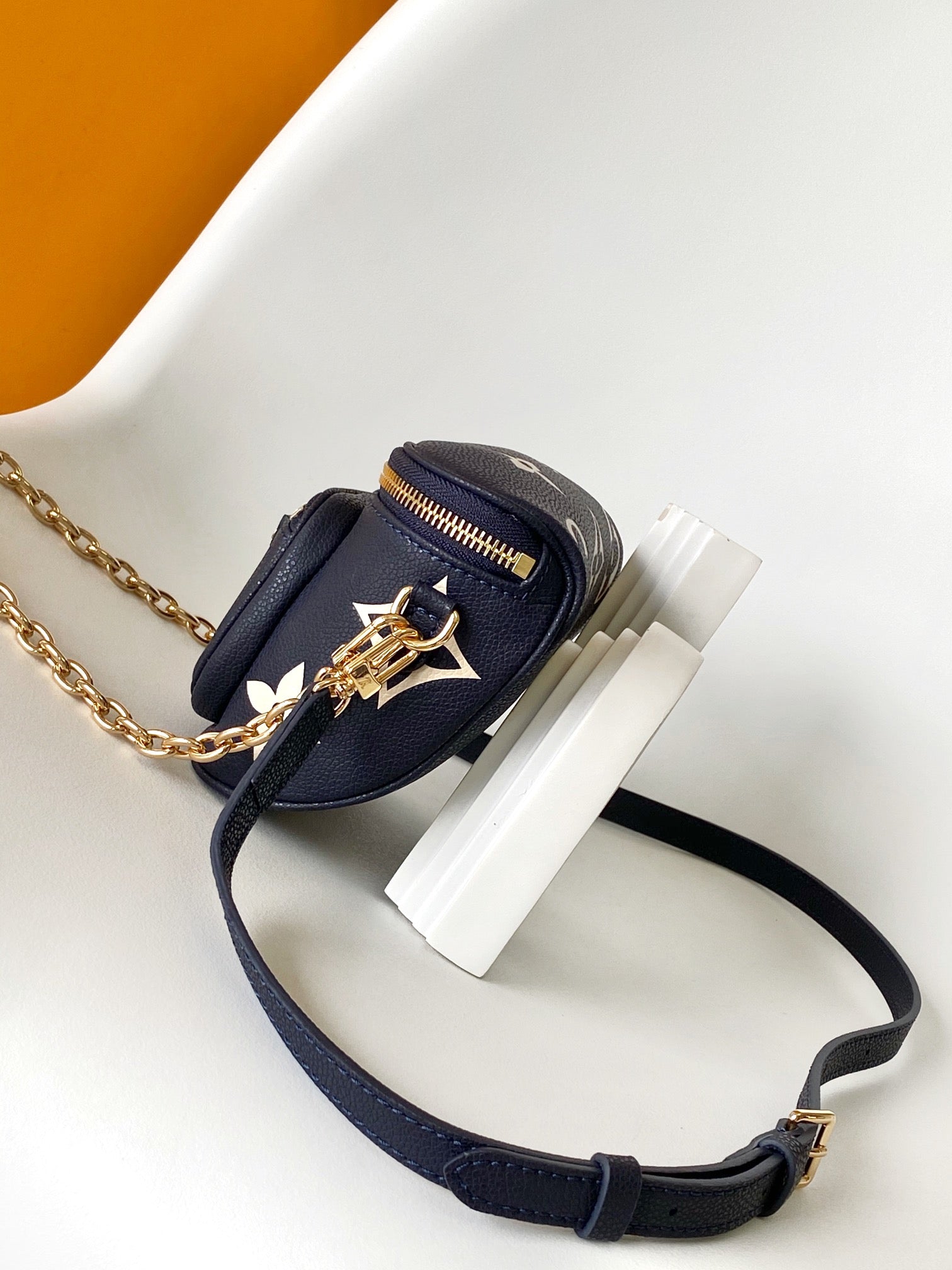 Louis Vuitton Navy Blue Leather Belt Bag with Gold Chain Strap and Floral Design