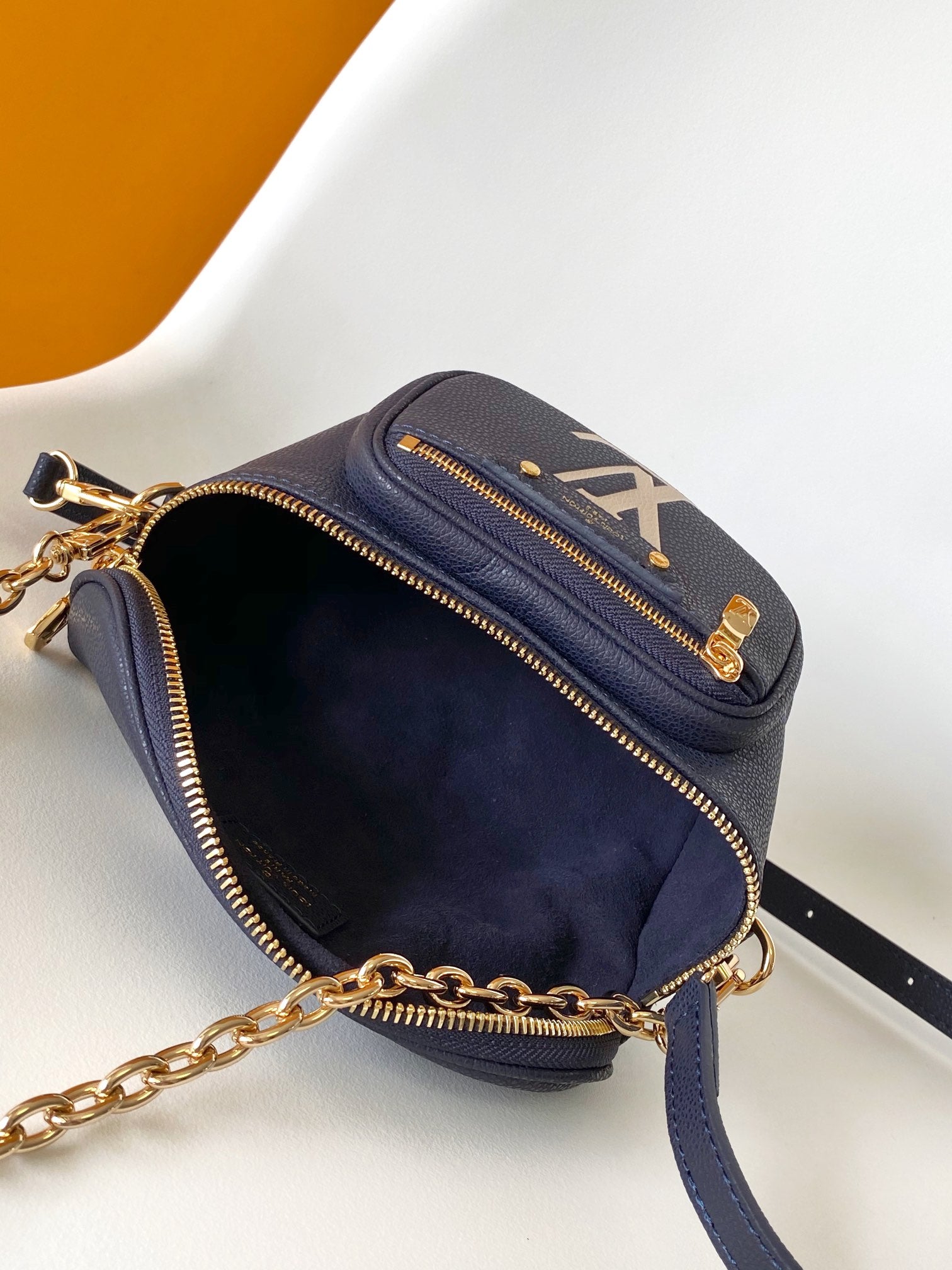 Louis Vuitton Navy Blue Leather Belt Bag with Gold Chain Strap and Floral Design