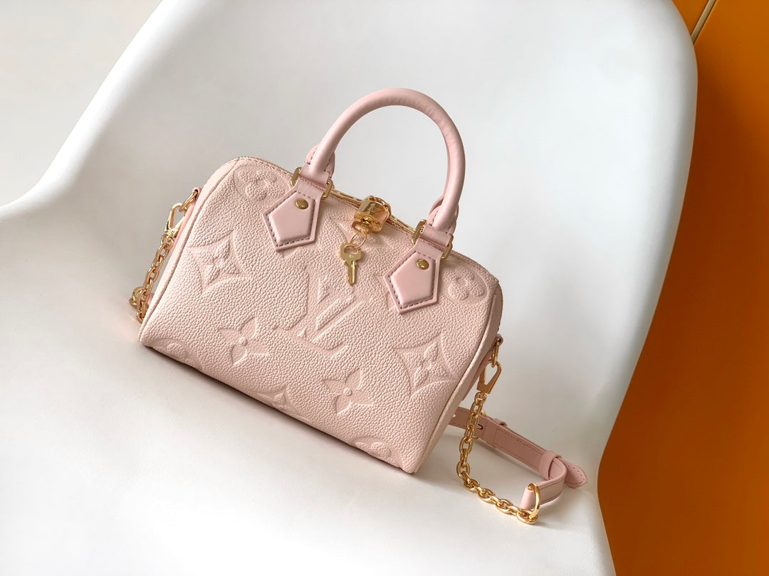 Louis Vuitton Elegant Pastel Pink Embossed Leather Top Handle Satchel Bag