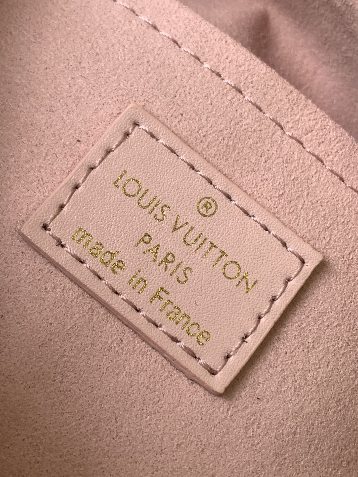 Louis Vuitton Elegant Pastel Pink Embossed Leather Top Handle Satchel Bag