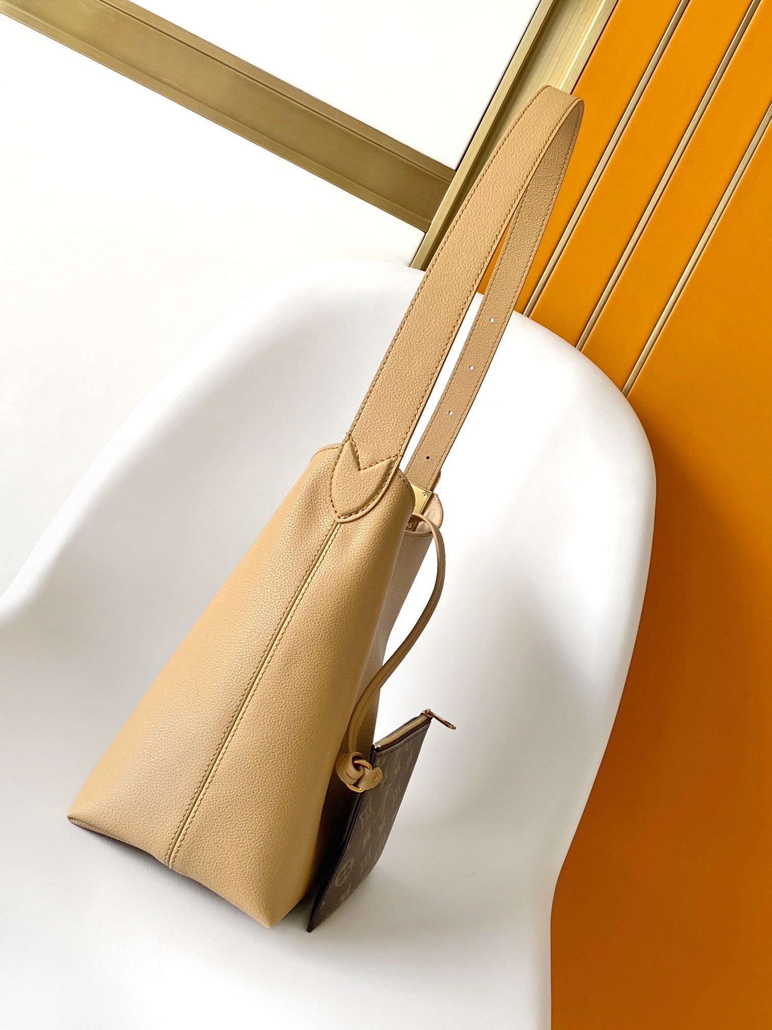 Louis Vuitton Minimalist Tan Leather Hobo Shoulder Bag with Adjustable Strap