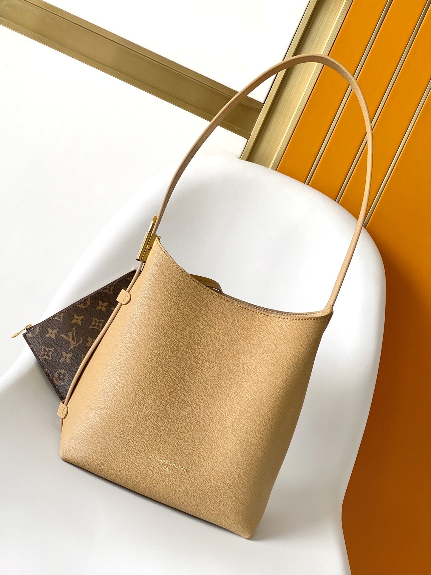 Louis Vuitton Minimalist Tan Leather Hobo Shoulder Bag with Adjustable Strap