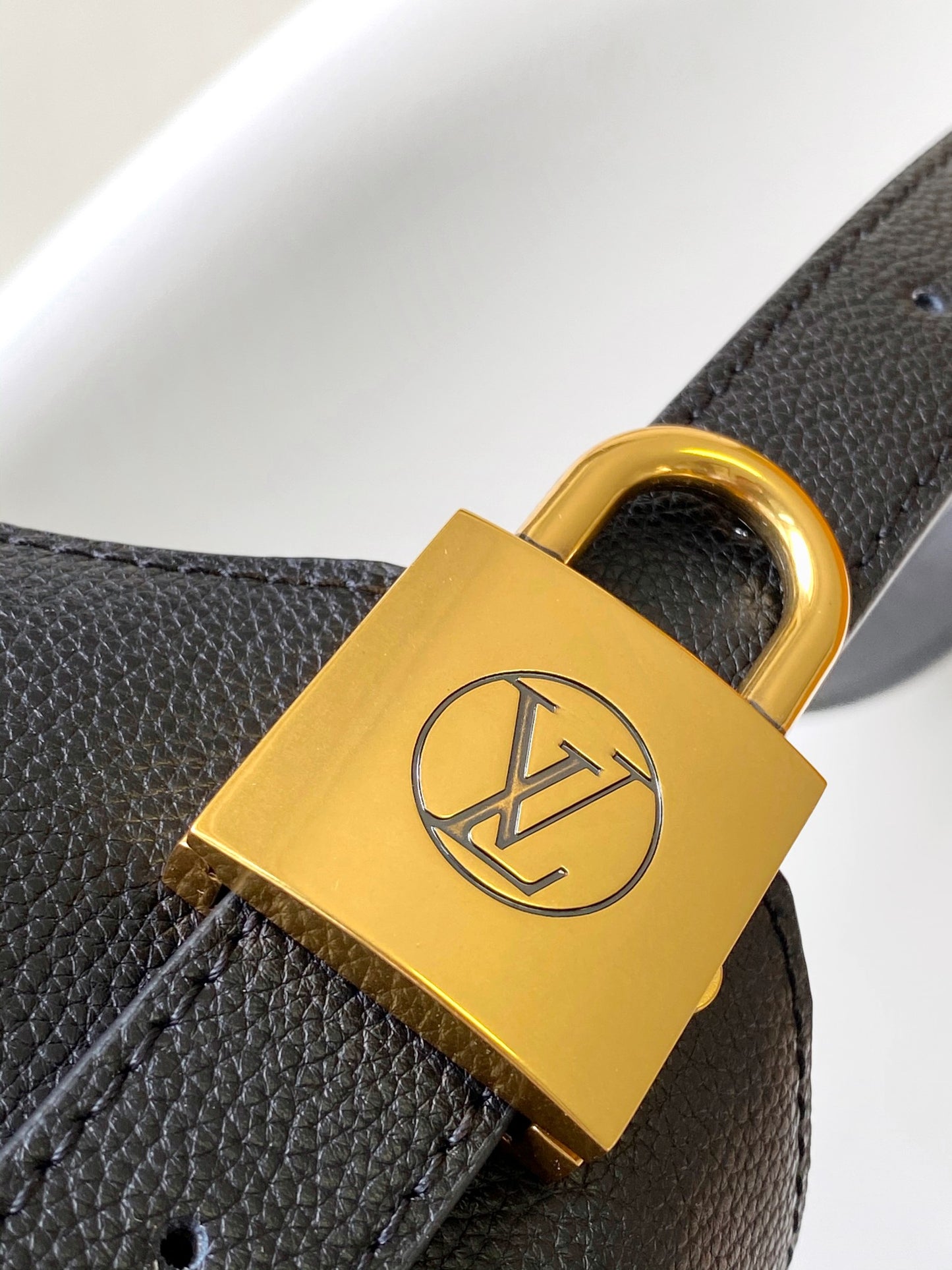 Louis Vuitton Minimalist Black Leather Hobo Shoulder Bag with Gold Accent