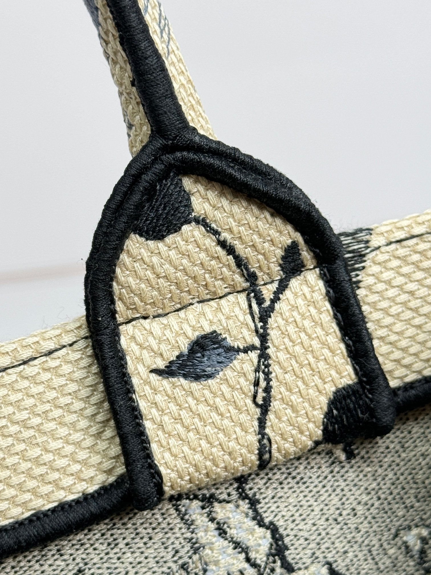 Dior Elegant Black Floral Canvas Tote Bag with Top Handles