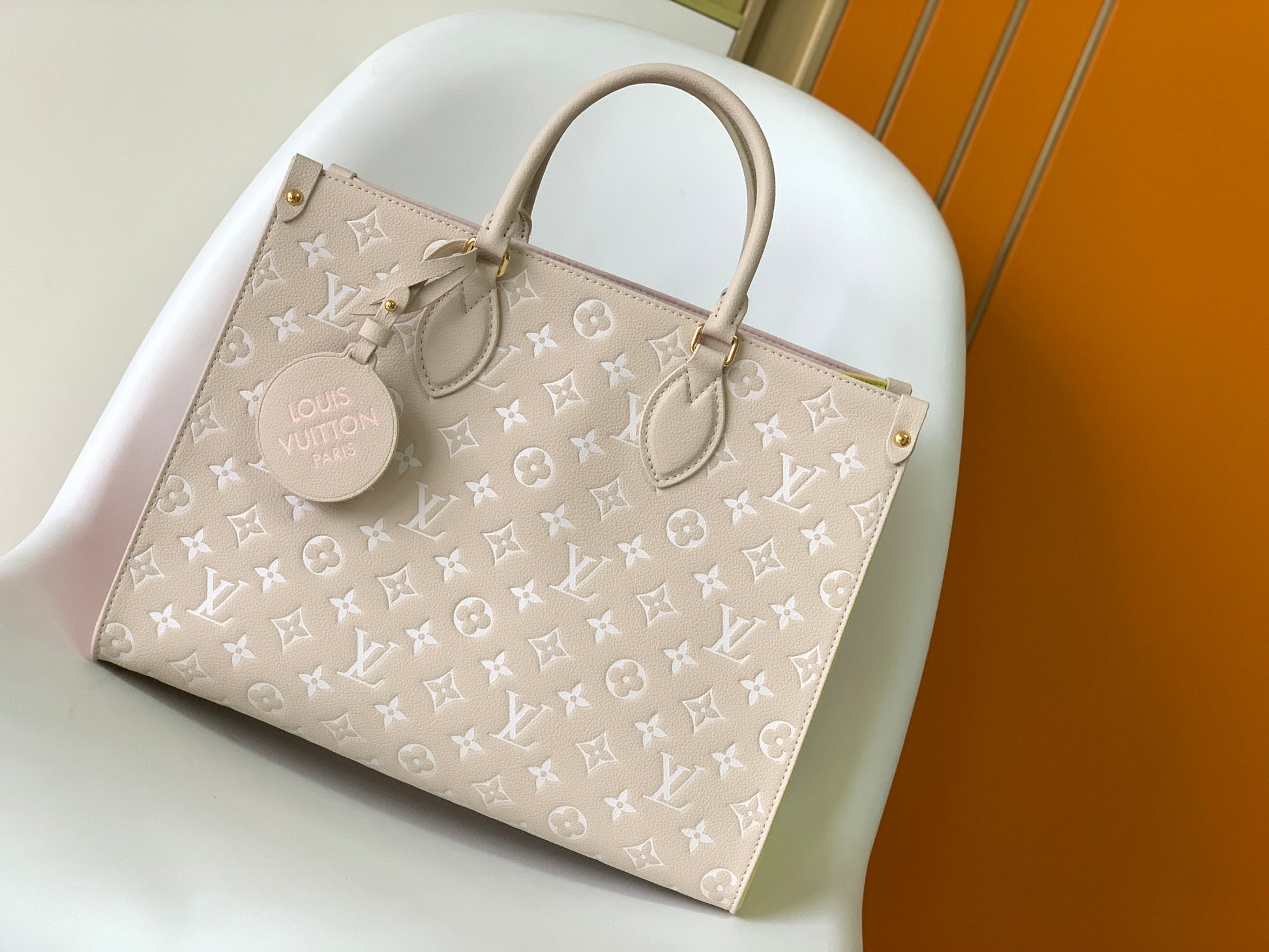 Louis Vuitton OnTheGo MM Monogram Empreinte Leather Tote Bag - Pink