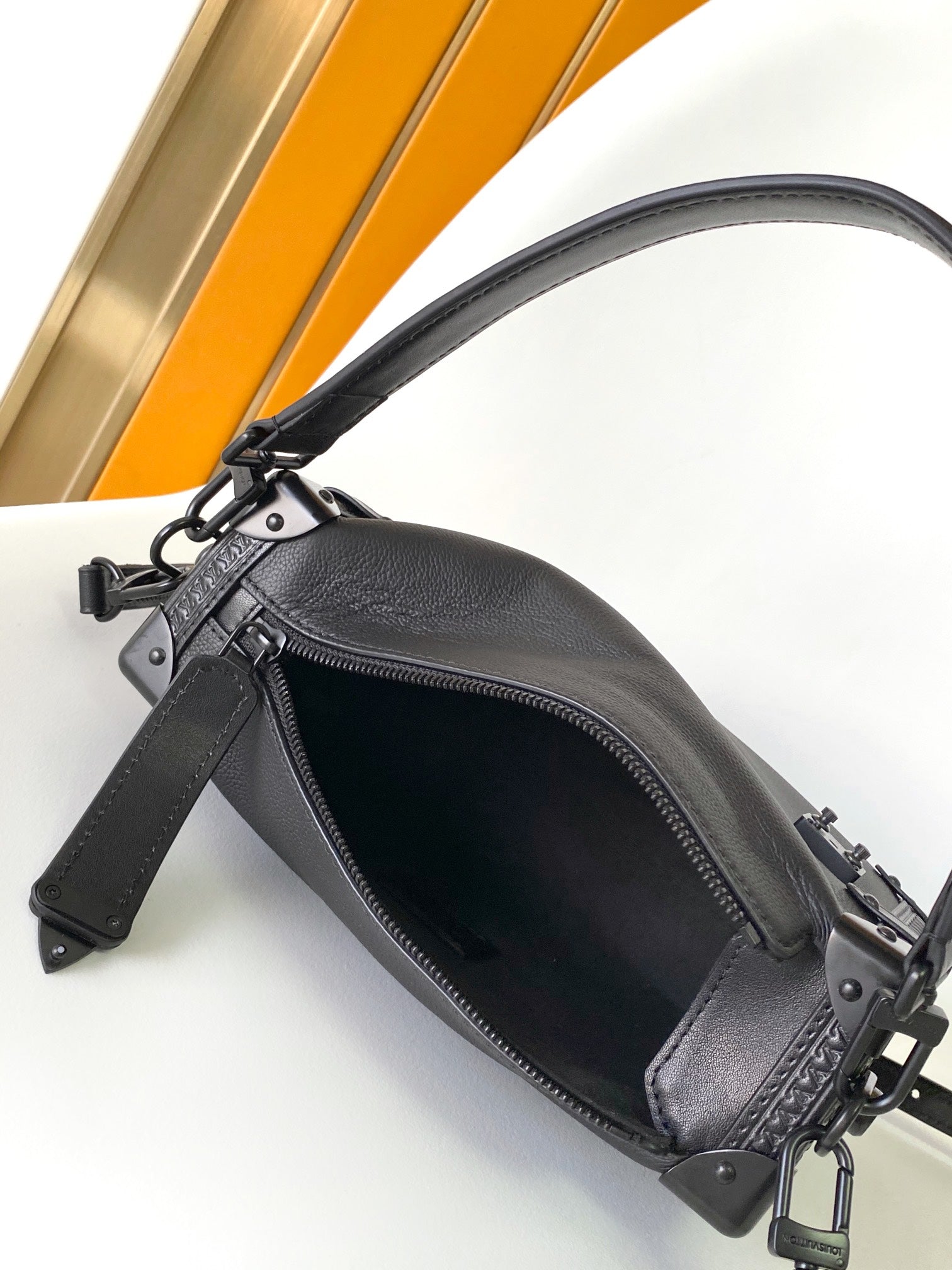 Louis Vuitton Elegant Black Underarm Shoulder Bag with Stud and Strap Details