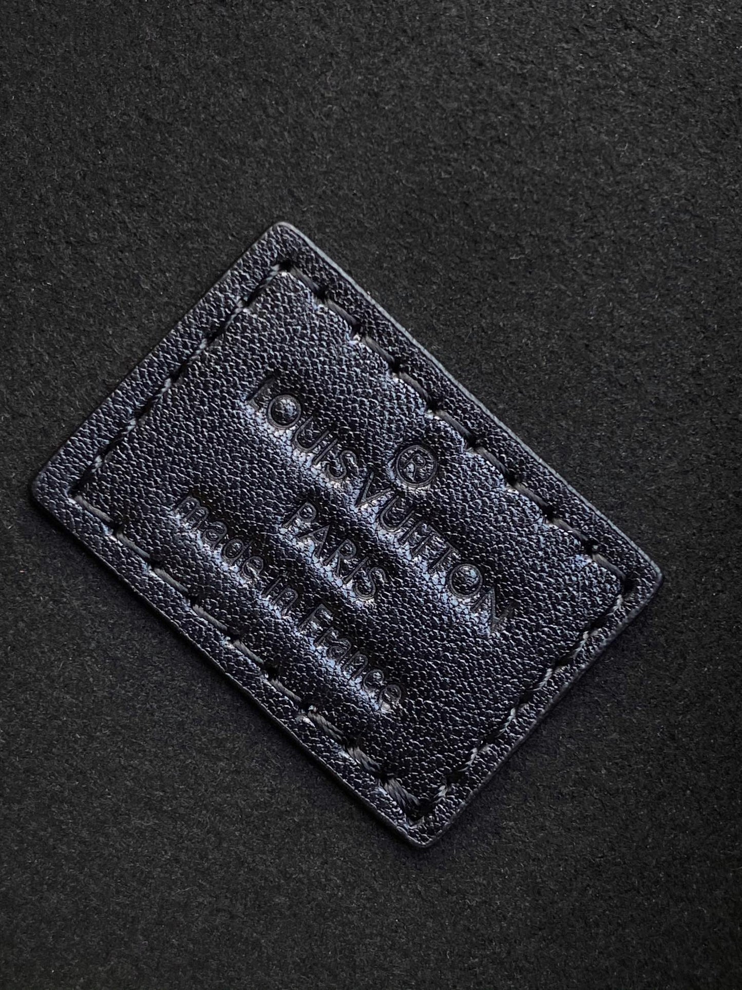 Louis Vuitton Elegant Black Underarm Shoulder Bag with Stud and Strap Details