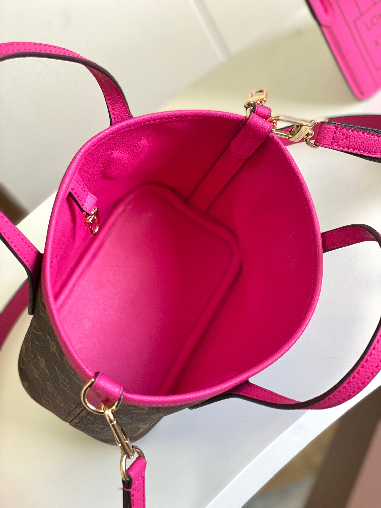 Louis Vuitton Fuchsia Pink Leather Tote Handbag with Embossed Detail and Gold Hardware