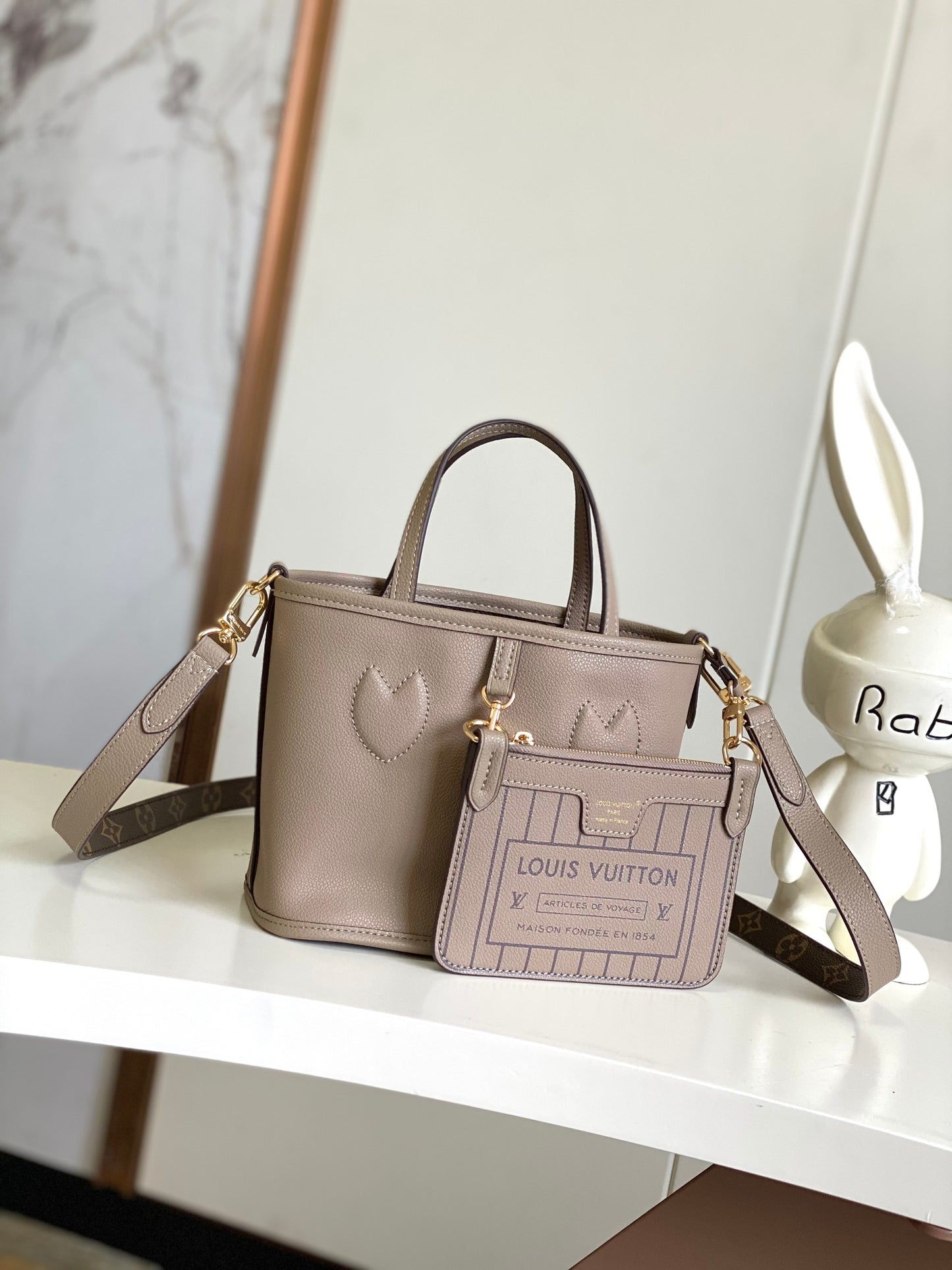 Louis Vuitton Classic Taupe Leather Bucket Bag with Top Handle and Strap