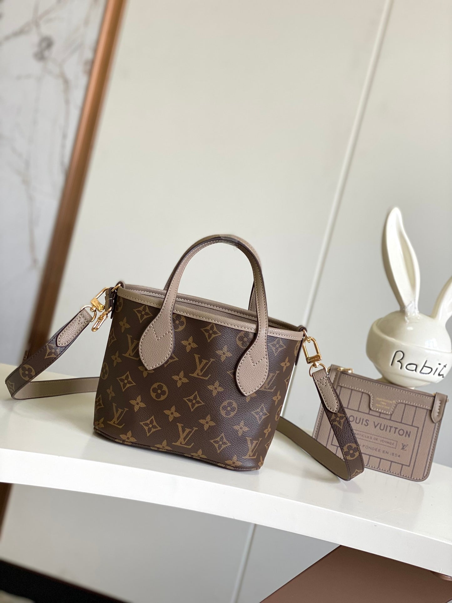 Louis Vuitton Classic Taupe Leather Bucket Bag with Top Handle and Strap