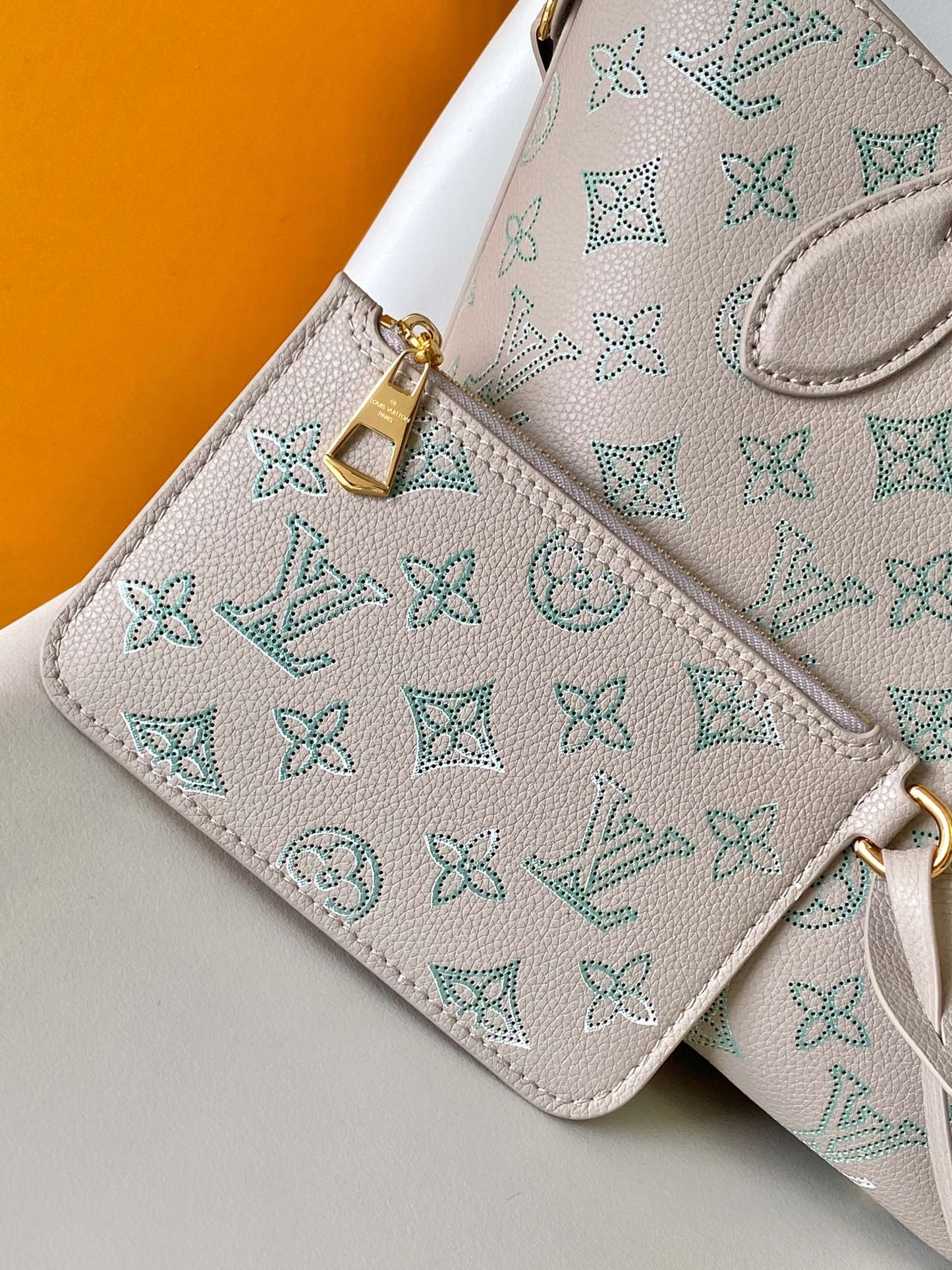 Louis Vuitton Elegant Light Pink Monogram Leather Tote Bag with Charm