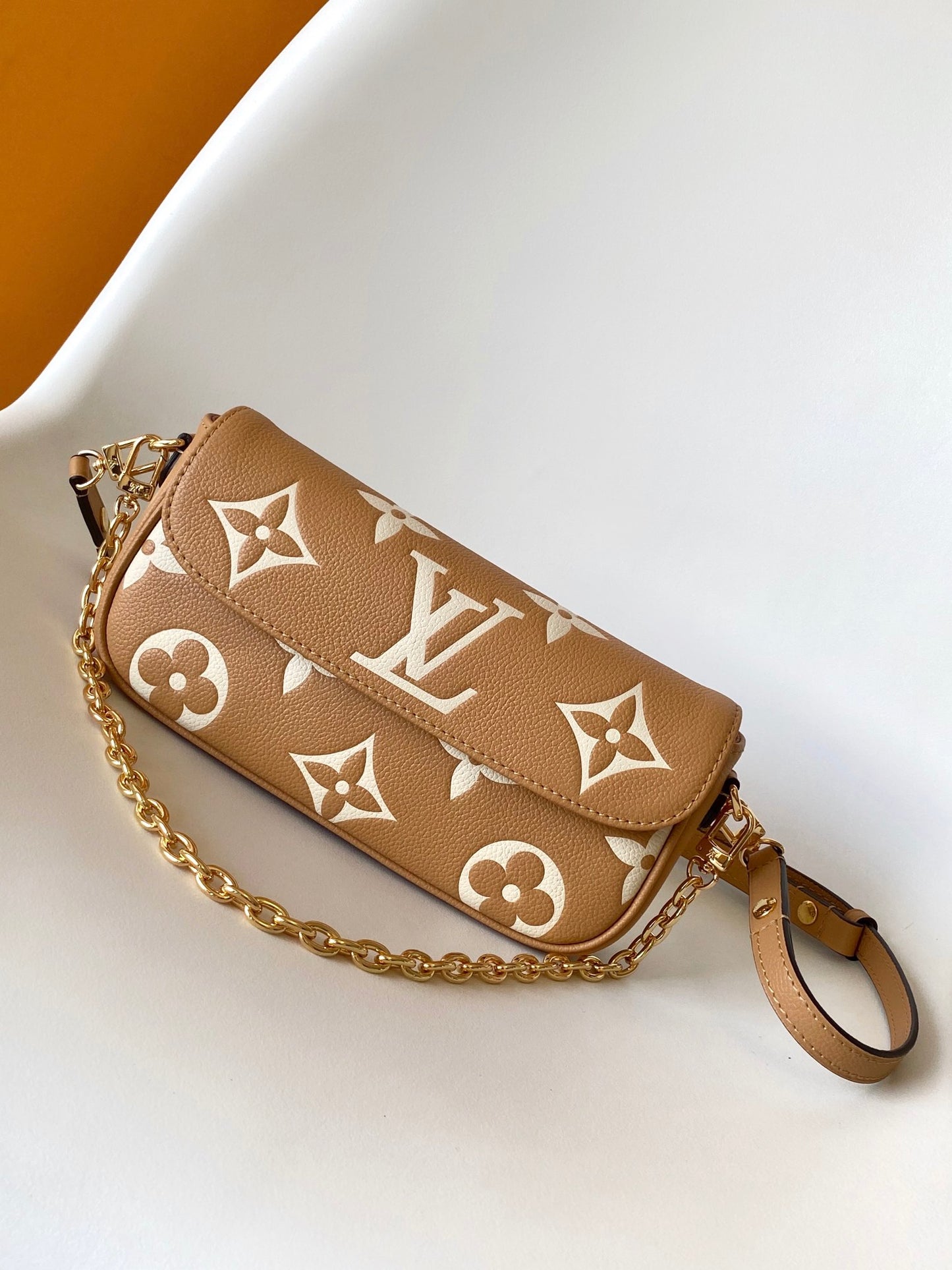 Louis Vuitton Elegant Beige Monogram Leather Crossbody Bag with Gold Chain