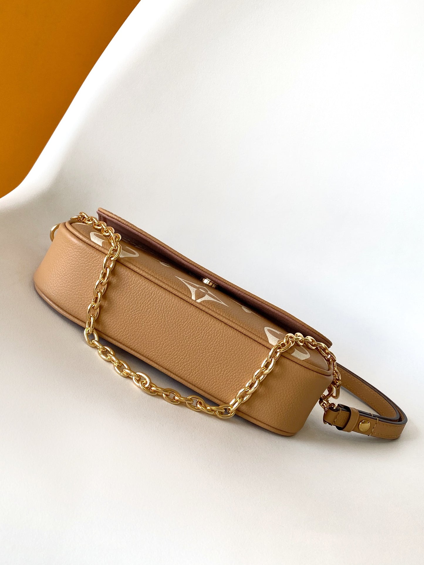 Louis Vuitton Elegant Beige Monogram Leather Crossbody Bag with Gold Chain