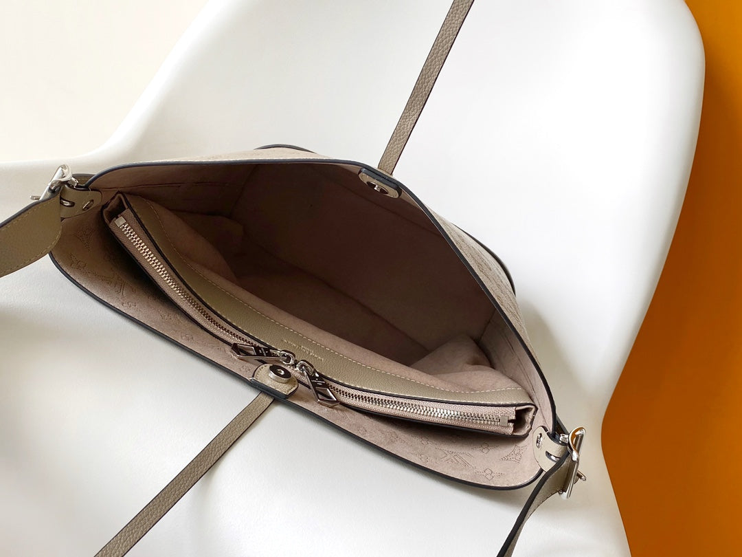 Louis Vuitton Taupe Embossed Leather Bucket Bag Drawstring Shoulder Purse