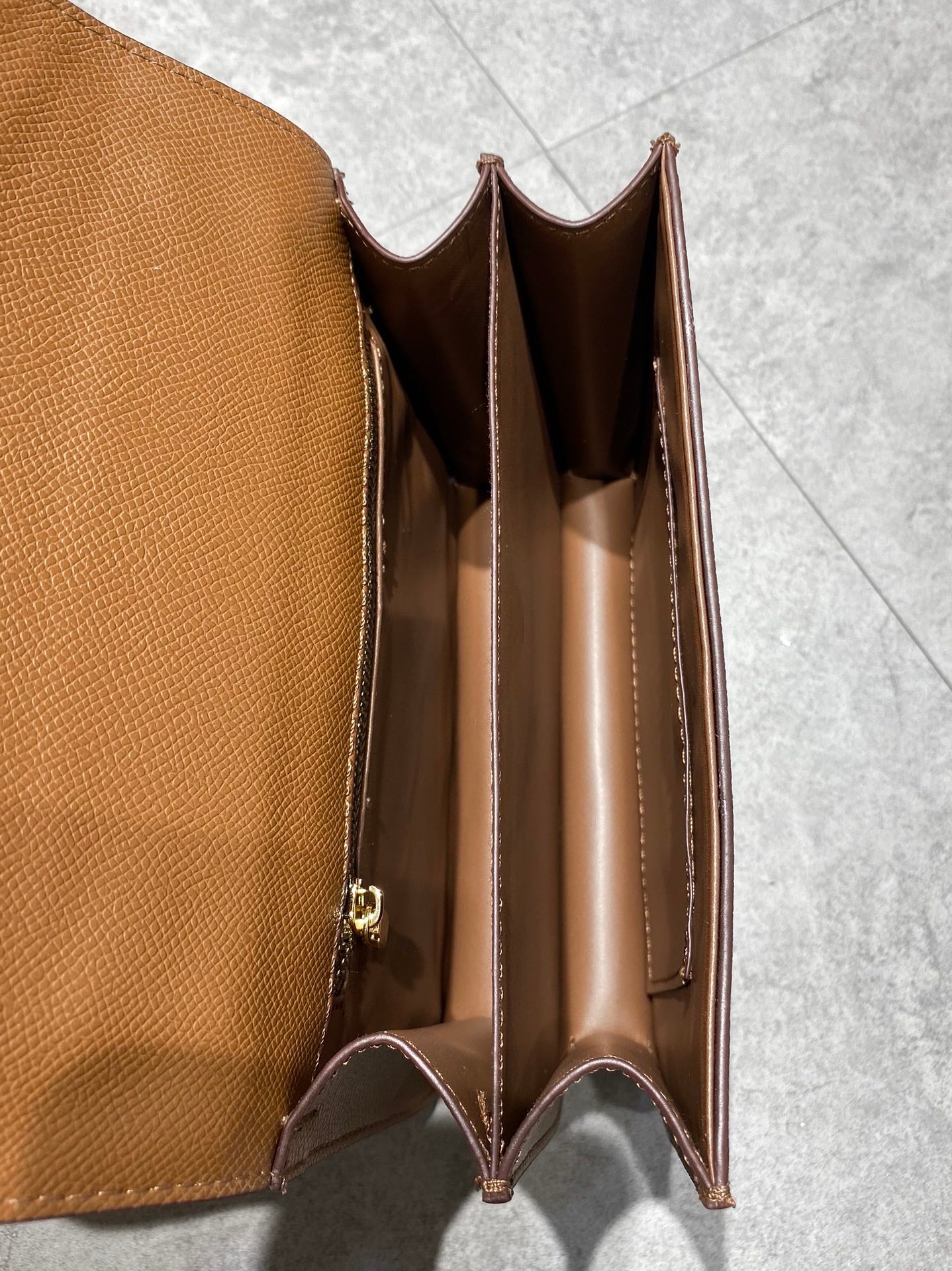 Elegant Tan Brown Leather Crossbody Bag with Gold-Tone H Buckle Hardware