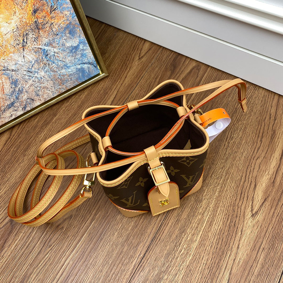 Louis Vuitton Classic Monogram Mini Bucket Bag with Leather Crossbody Strap