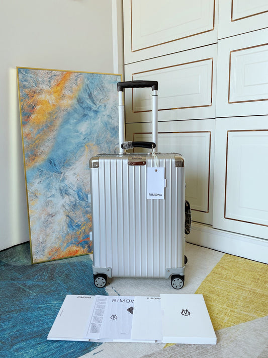 Ribbed Silver Aluminum Carry-On Suitcase with Spinner Wheels