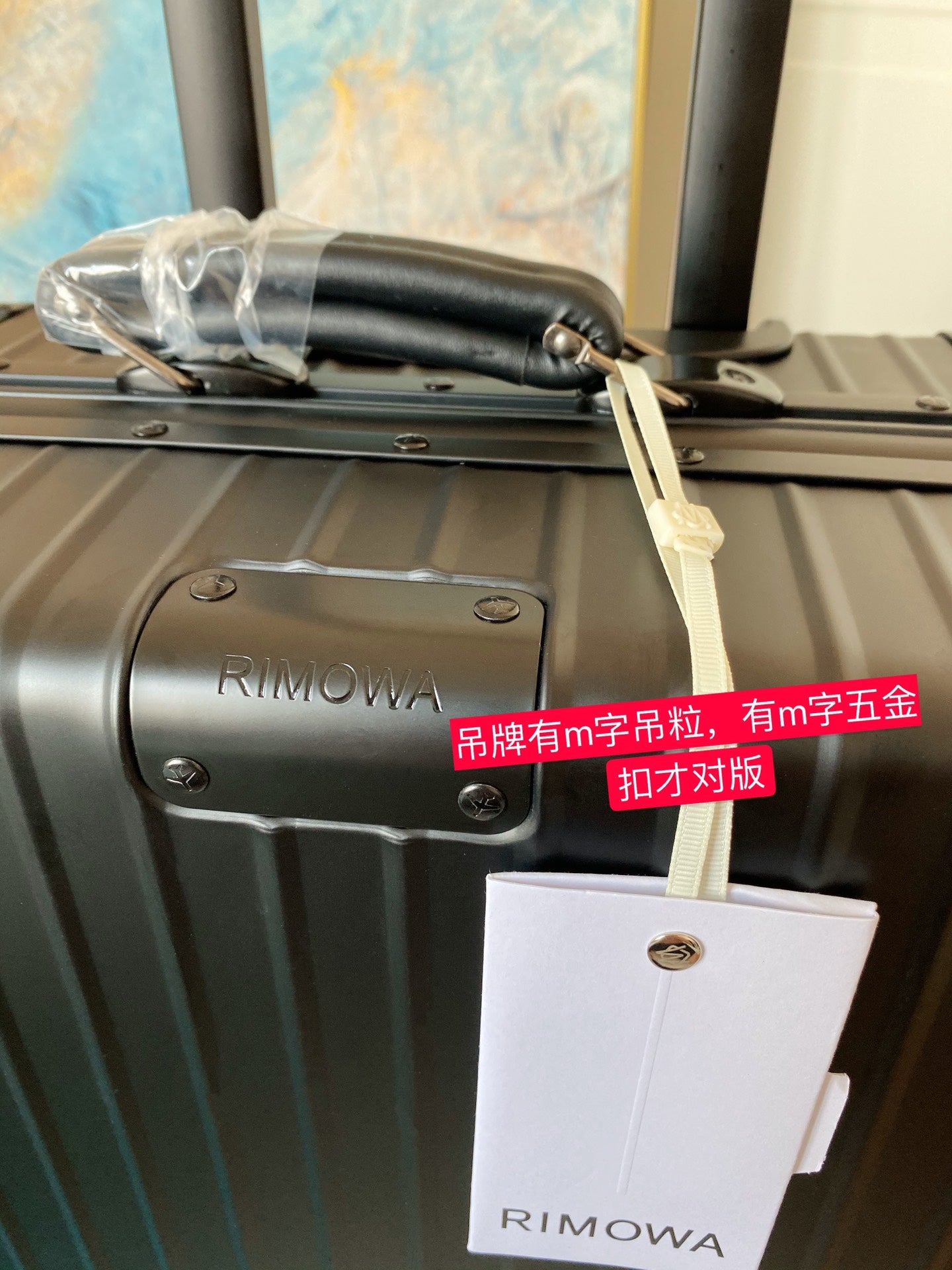 Sleek Matte Black Ribbed Carry-On Hardshell Spinner Suitcase