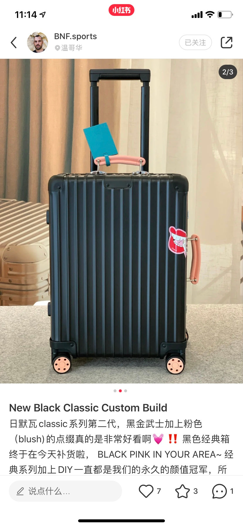 Matte Black Hardshell Spinner Suitcase with Orange Handles and Wheels