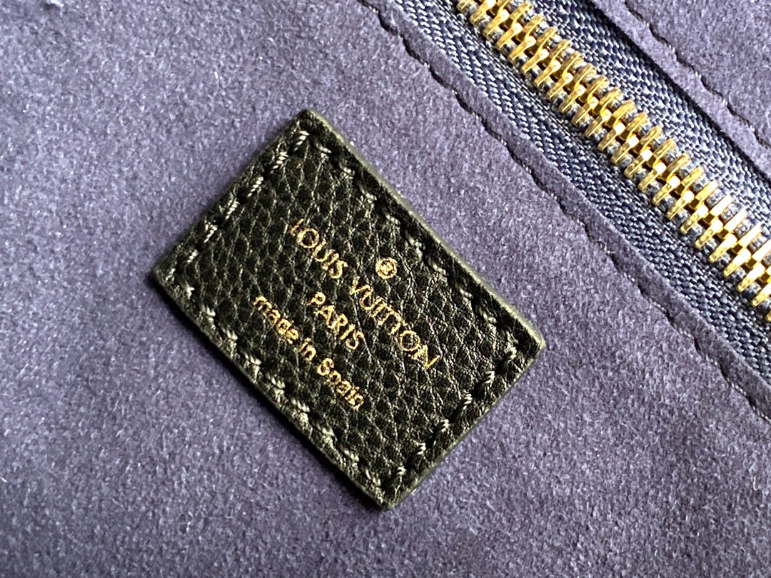 Louis Vuitton Elegant Black Embossed Leather Tote Bag with Double Handles